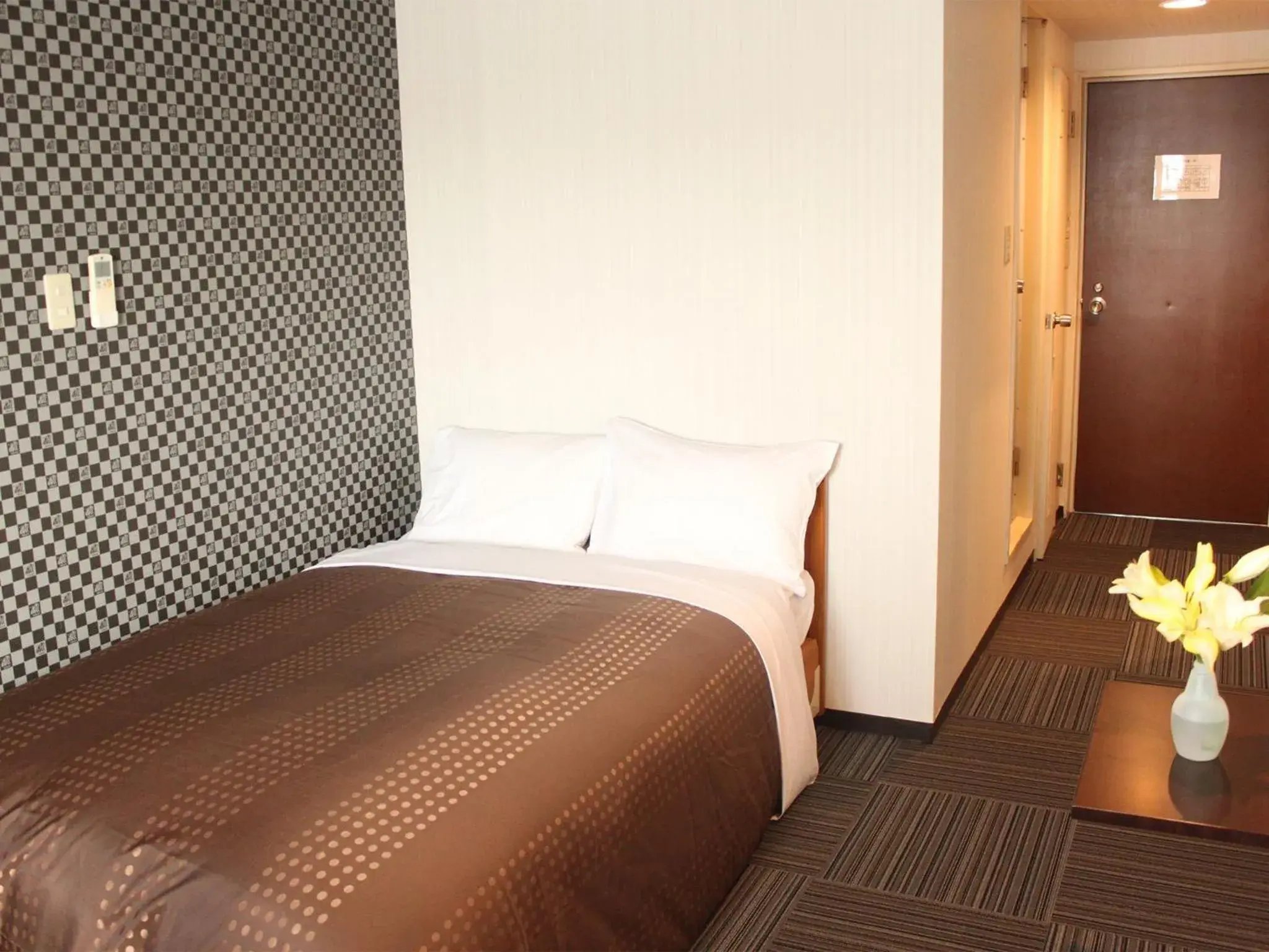 Photo of the whole room, Bed in HOTEL LiVEMAX BUDGET Tokyo Hamura Ekimae