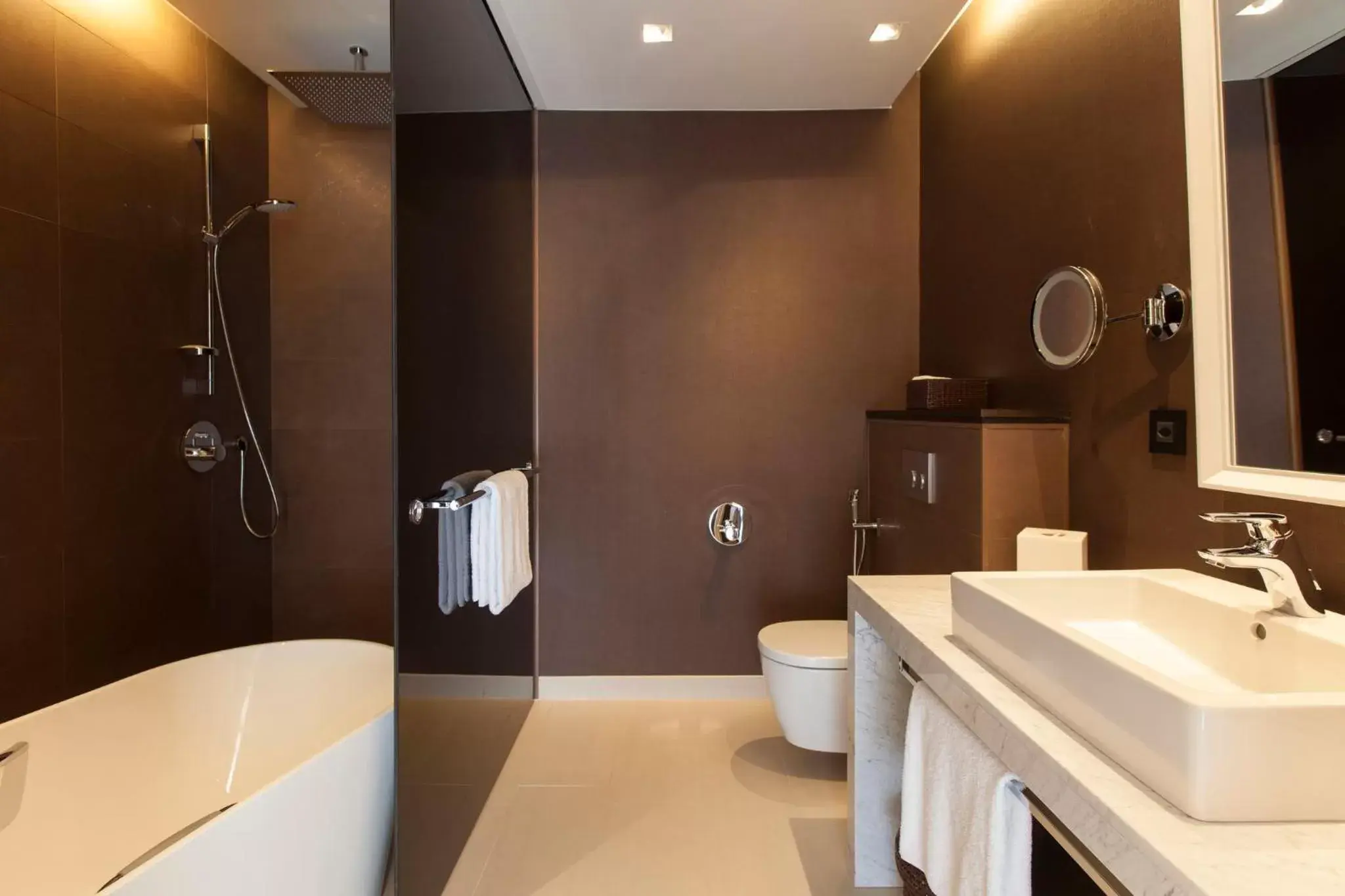 Bedroom, Bathroom in Crowne Plaza Geneva, an IHG Hotel