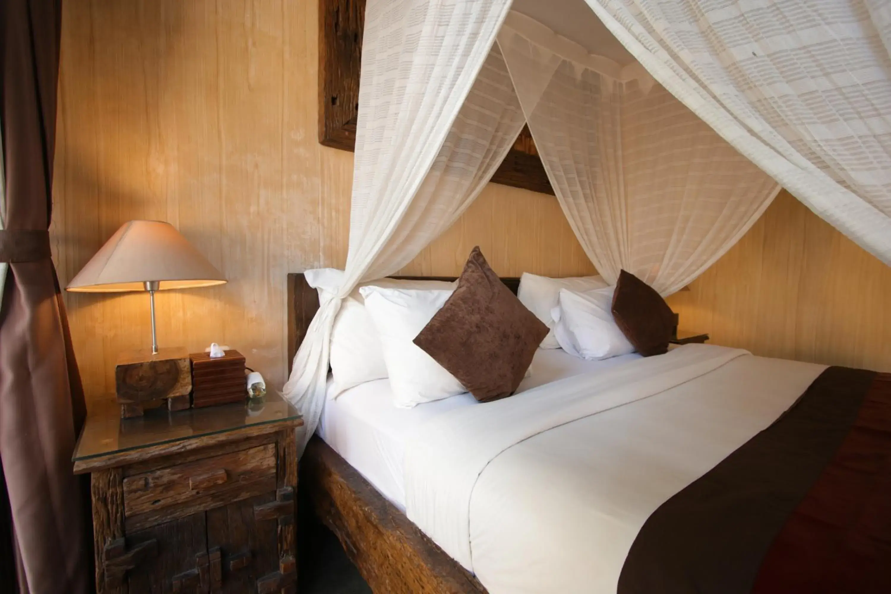 Bed in Gino Feruci Villa Ubud by KAGUM Hotels