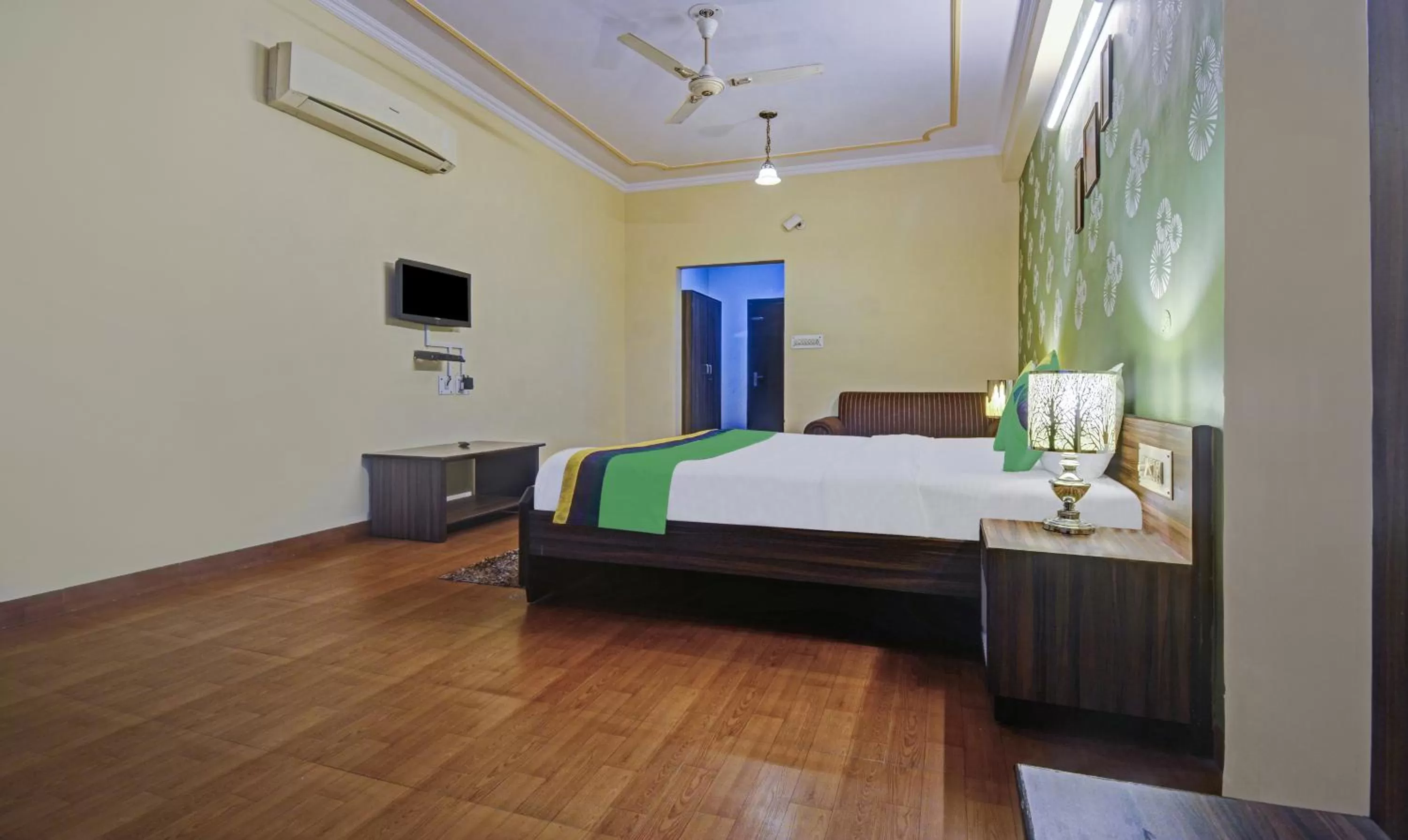 Bedroom, Bed in Treebo New Rockwell Vivek Vihar