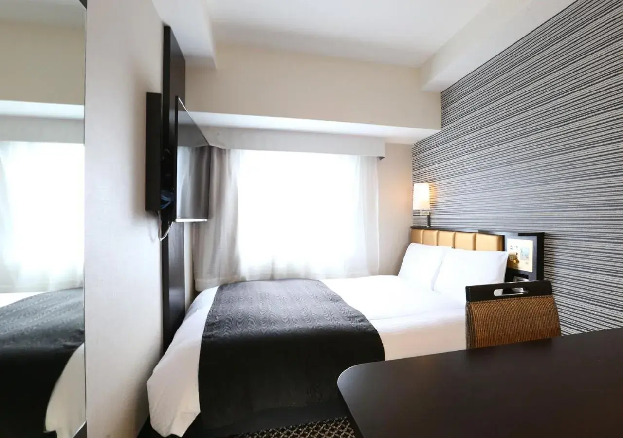 Bed in APA Hotel Shinagawa Sengakuji Eki-Mae