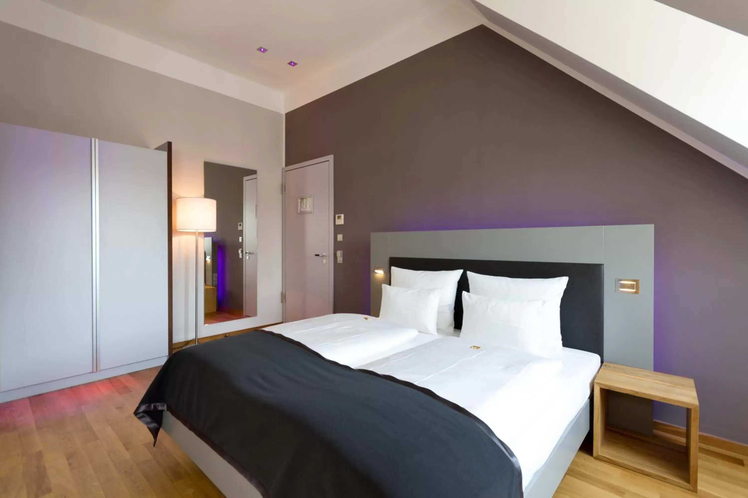 Bed in Qube Hotel Bergheim