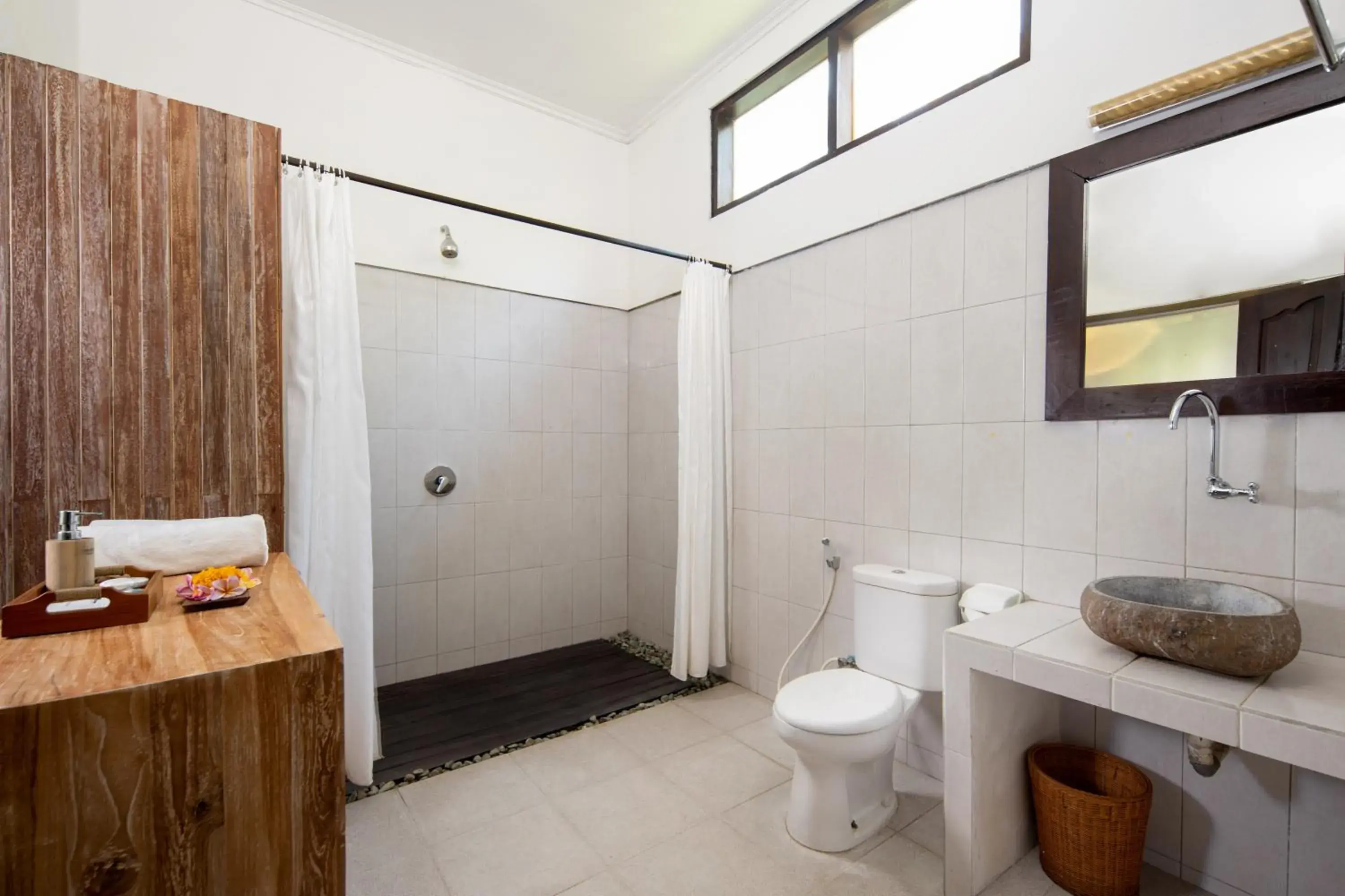 Bathroom in Ubud Raya Boutique Hotel Bathroom in Ubud Raya Boutique Hotel