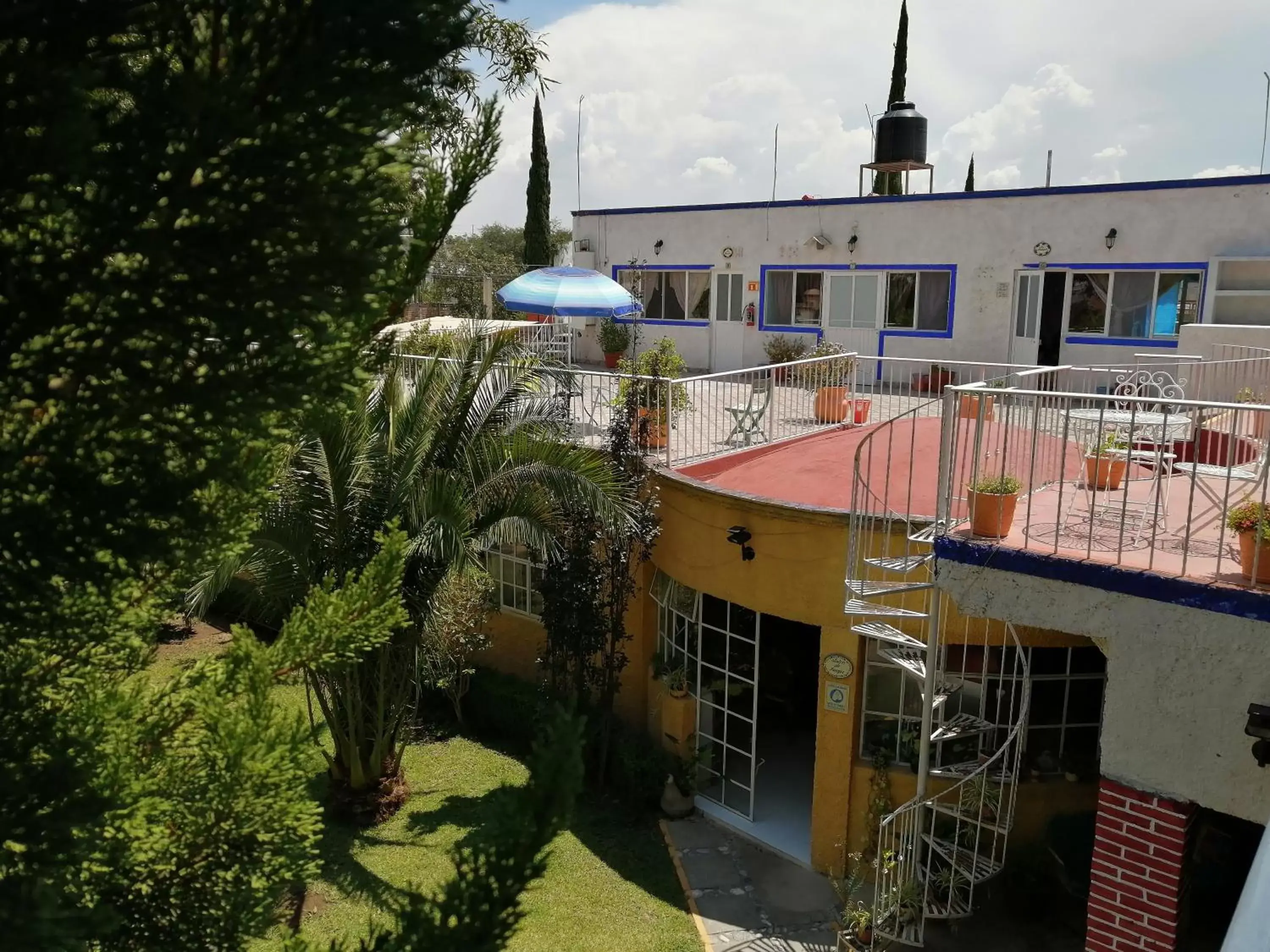 Garden view, Property Building in Hotel Elohim by Rotamundos