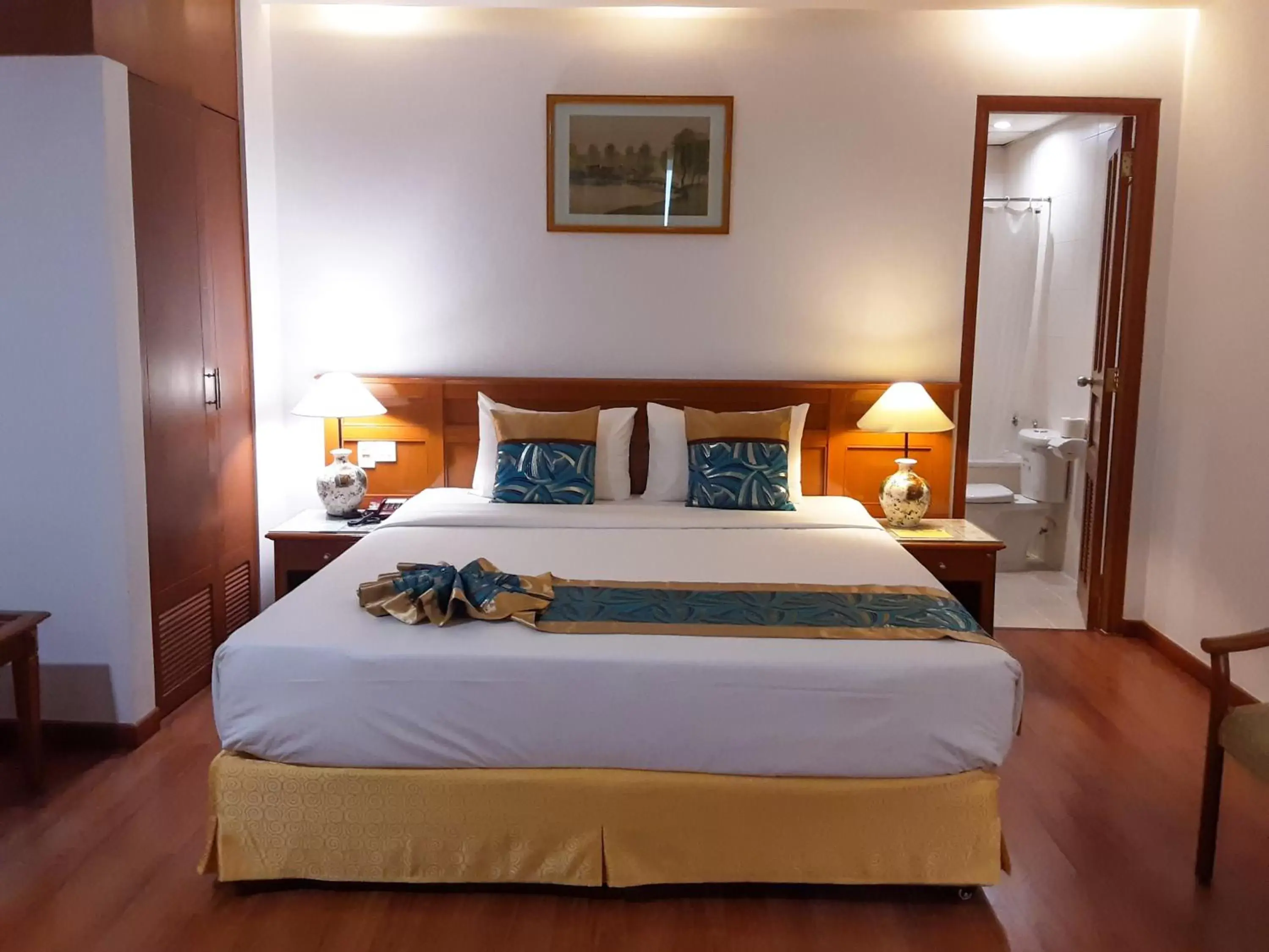 Bed in Oscar Saigon Hotel