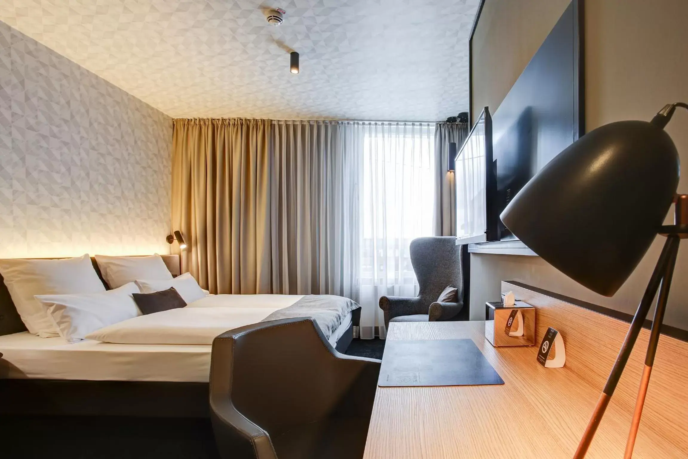 Photo of the whole room, Bed in NYCE Hotel Dortmund City