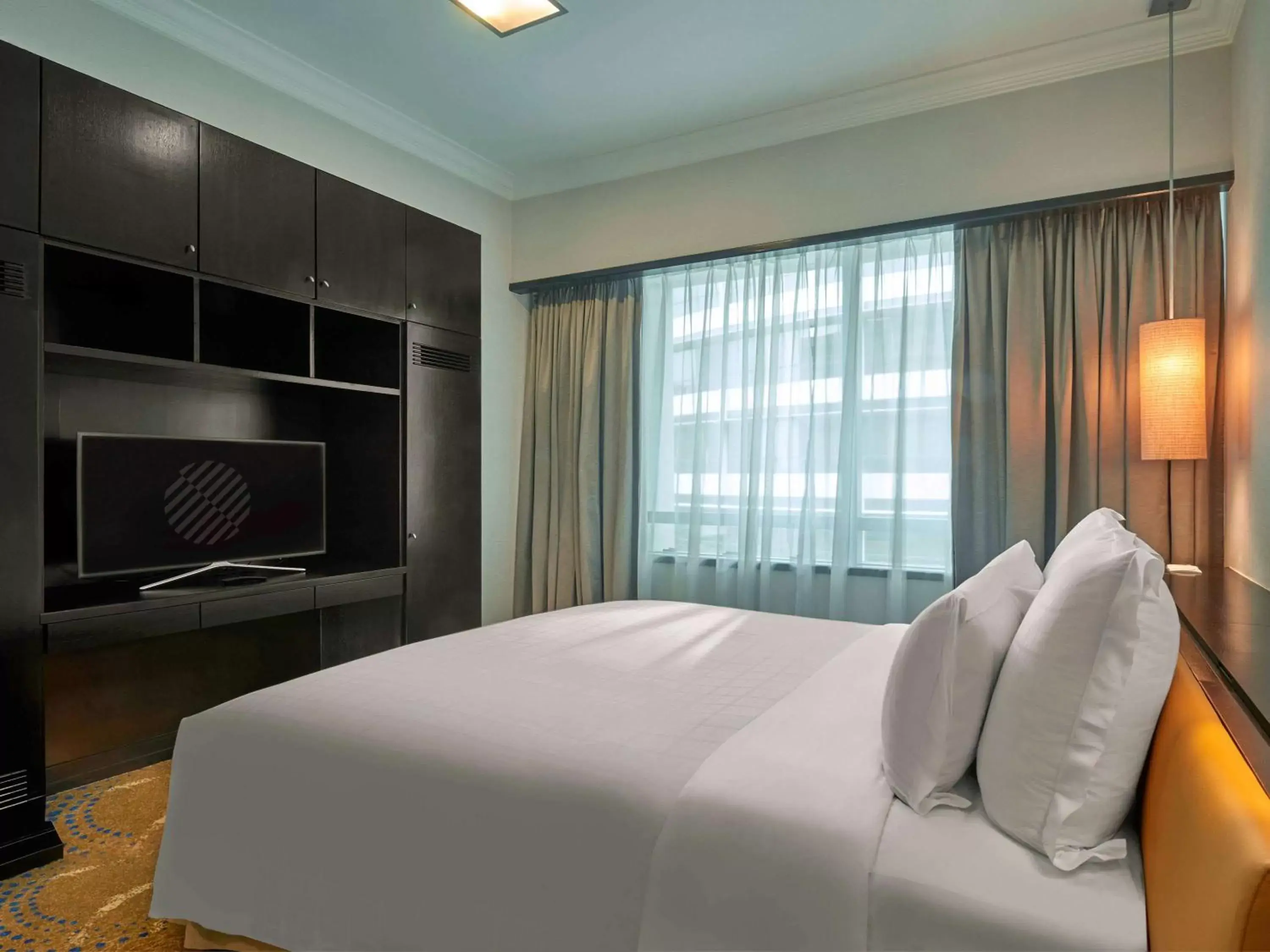 Photo of the whole room, Bed in Pullman Kuala Lumpur City Centre Hotel & Residences