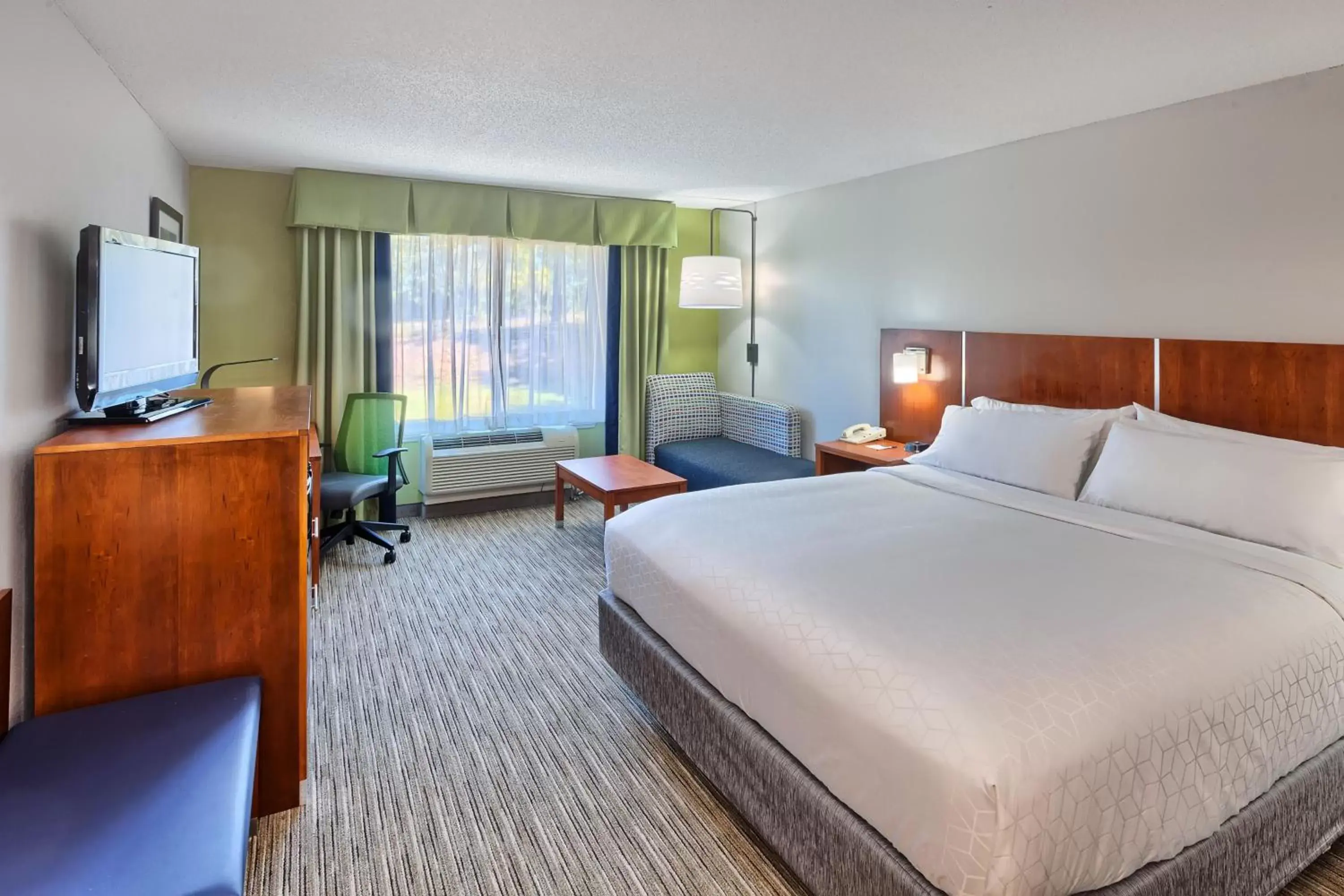 Bed in Holiday Inn Express Hotel & Suites Raleigh North - Wake Forest, an IHG Hotel