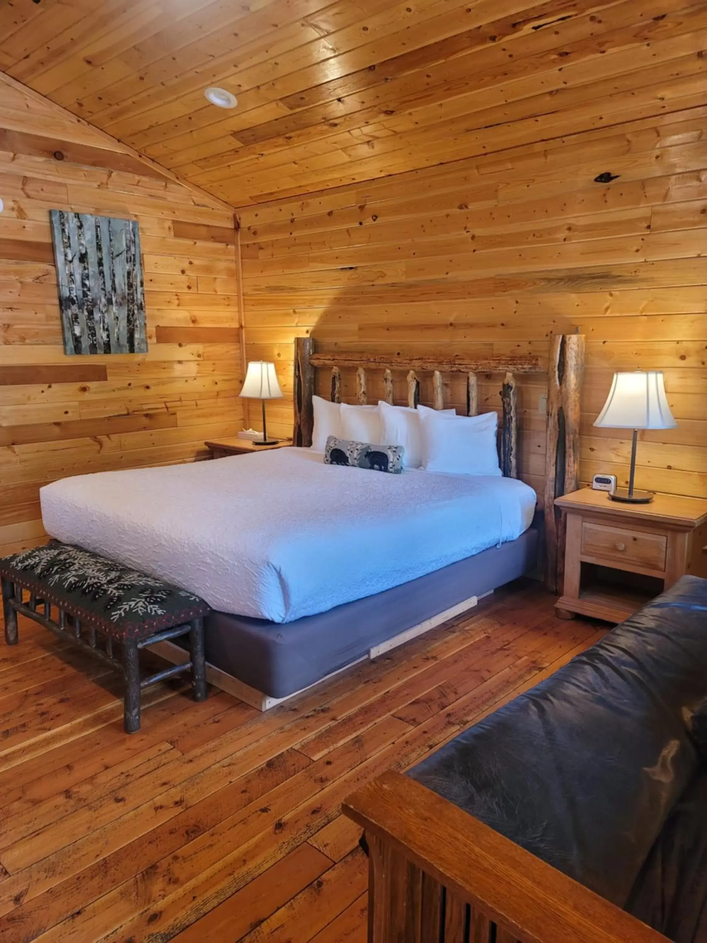 Bed in Riverfront Motel & Cabins