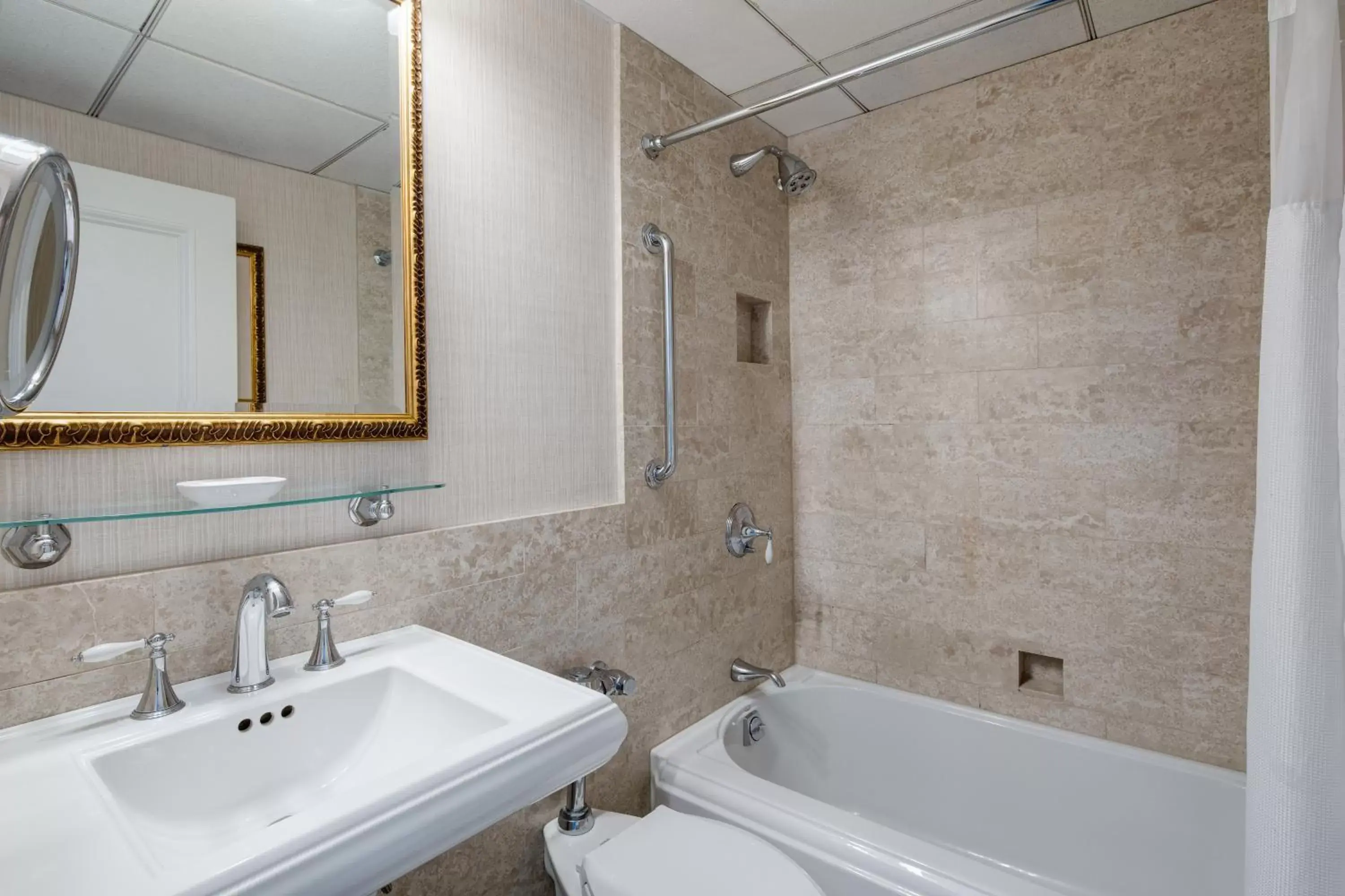 Bathroom in Amway Grand Plaza Hotel, Curio Collection by Hilton