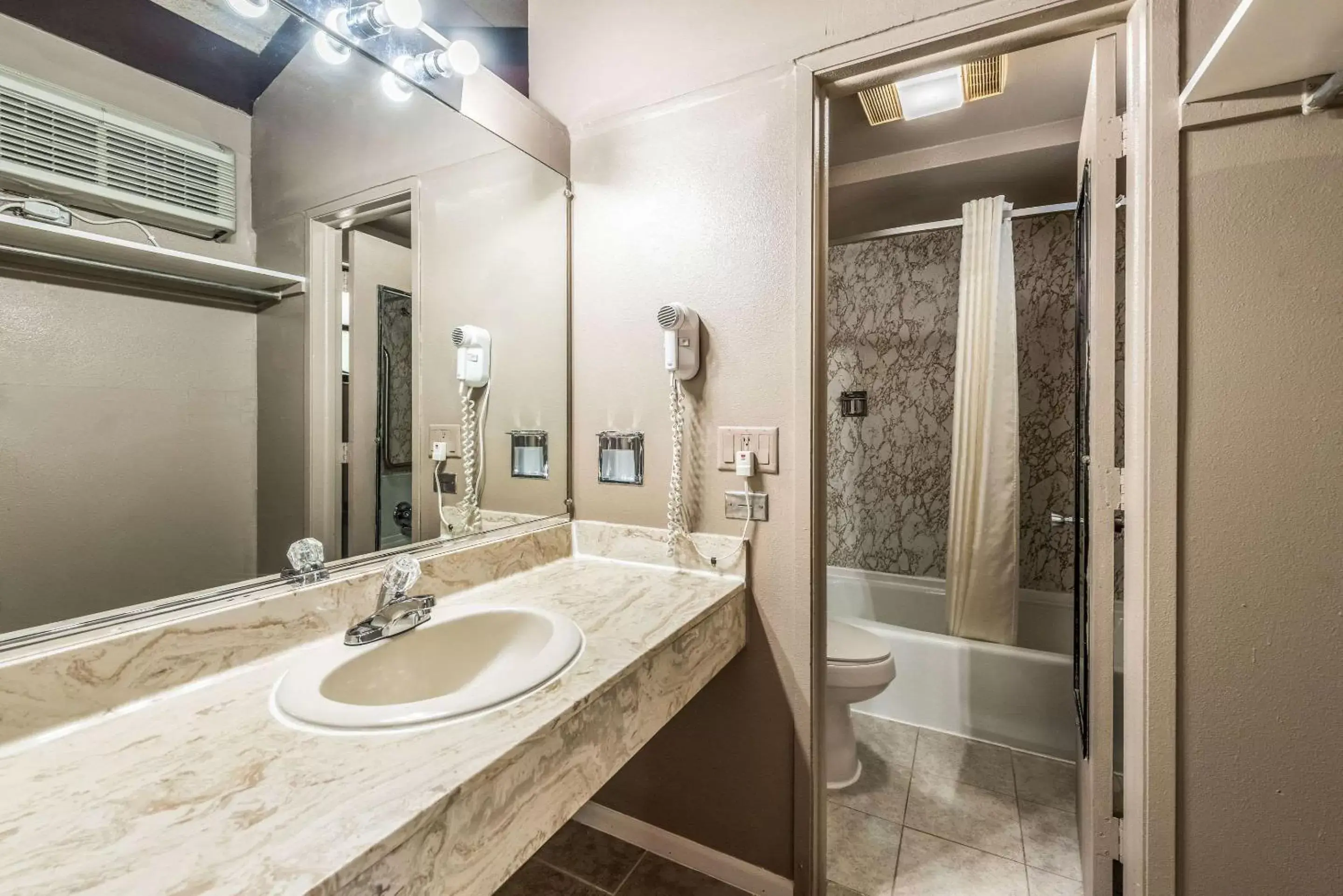 Photo of the whole room, Bathroom in Rodeway Inn