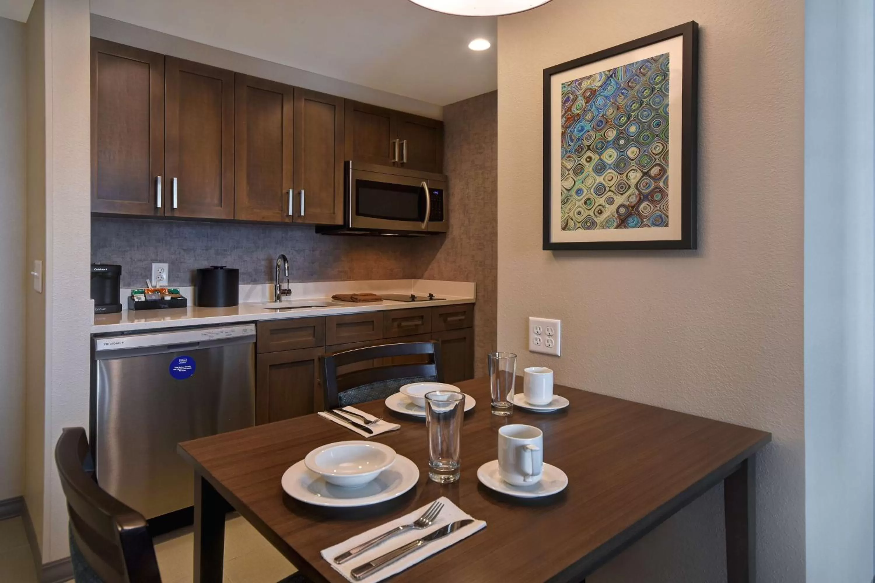 Kitchen or kitchenette in Homewood Suites By Hilton Orlando Flamingo Crossings, Fl