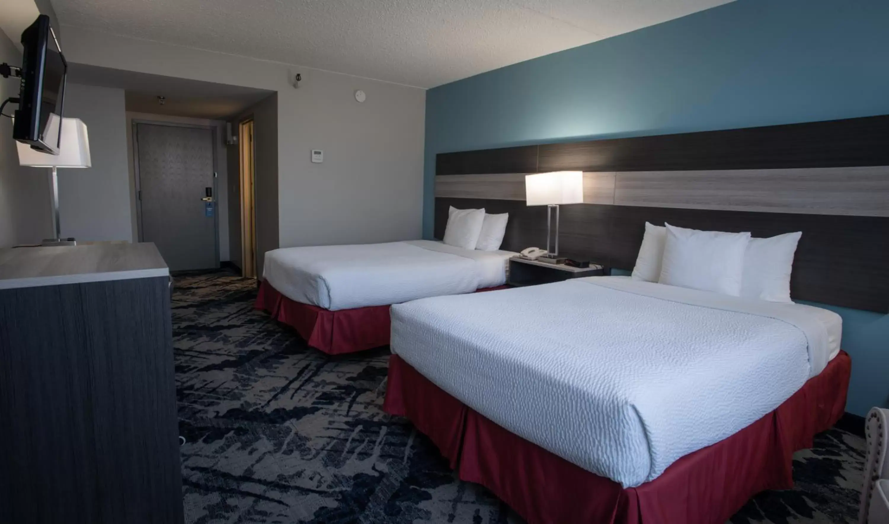 Bed in Days Hotel by Wyndham East Brunswick Conference Center