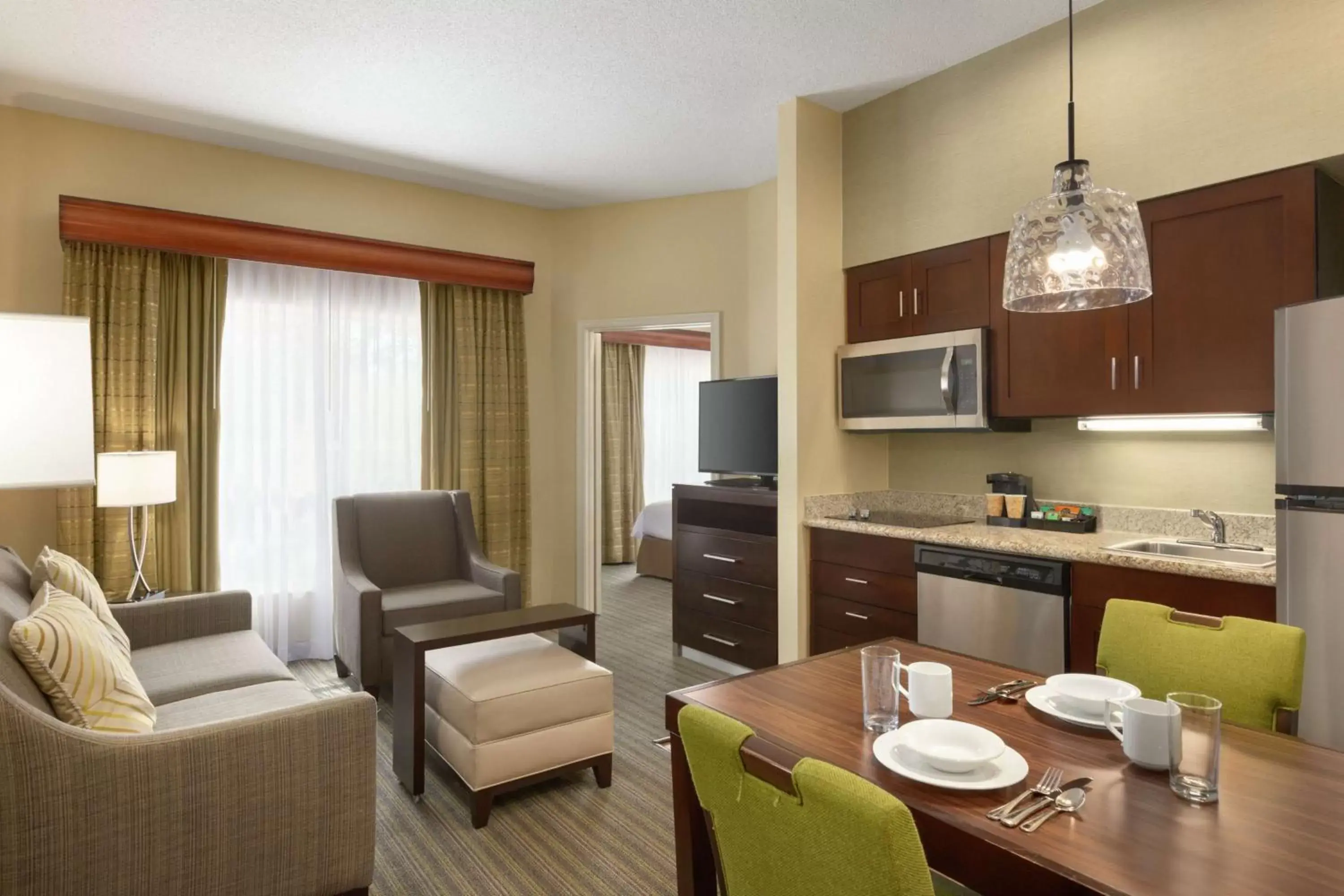 Living room, Dining Area in Homewood Suites by Hilton St. Petersburg Clearwater