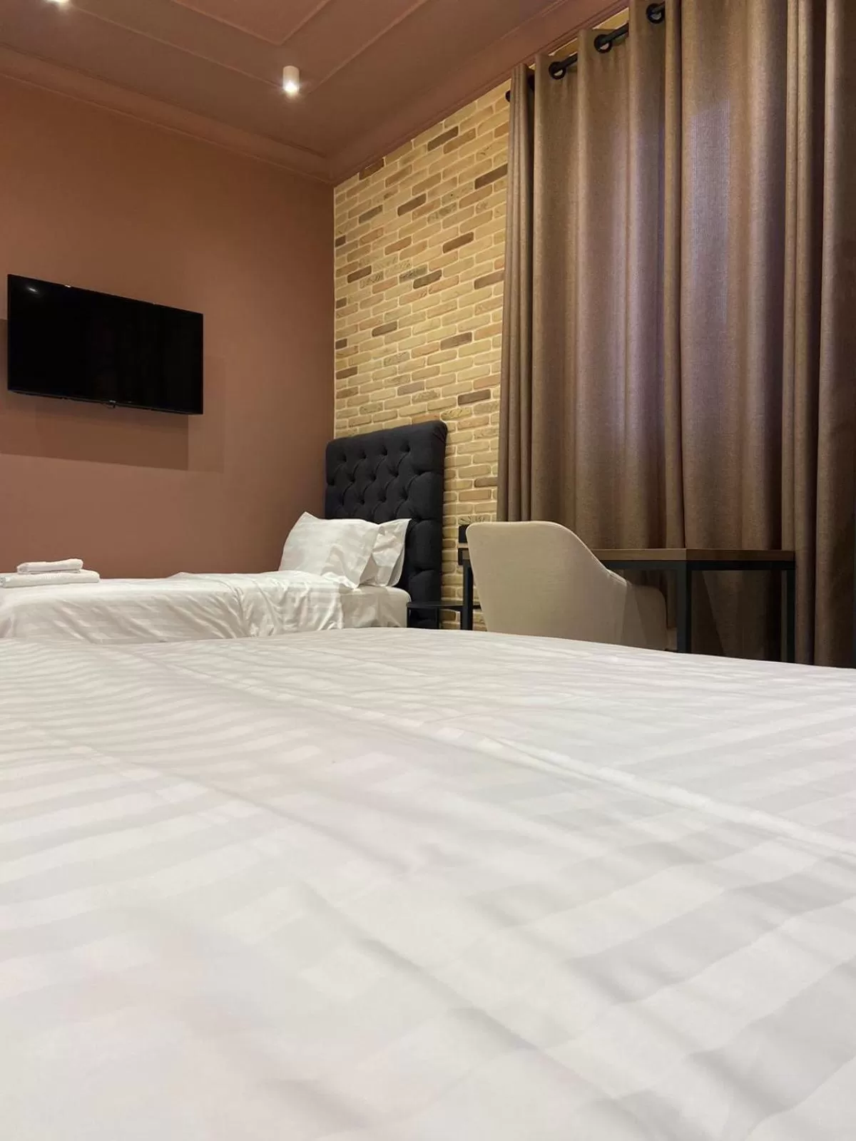 Communal lounge/ TV room, Bed in Ardenica Boutique Hotel