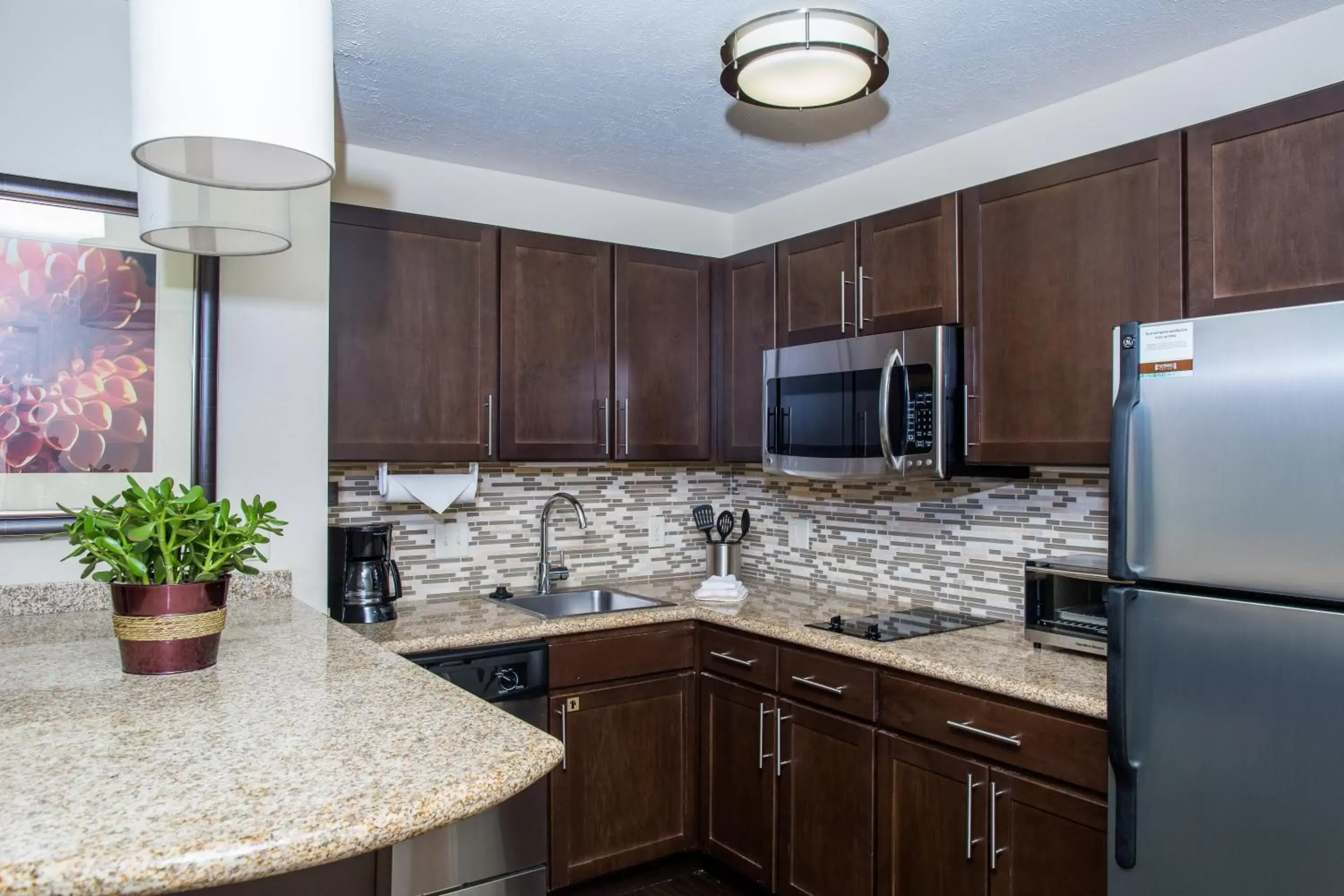 Photo of the whole room, Kitchen/Kitchenette in Staybridge Suites Lincoln North East, an IHG Hotel