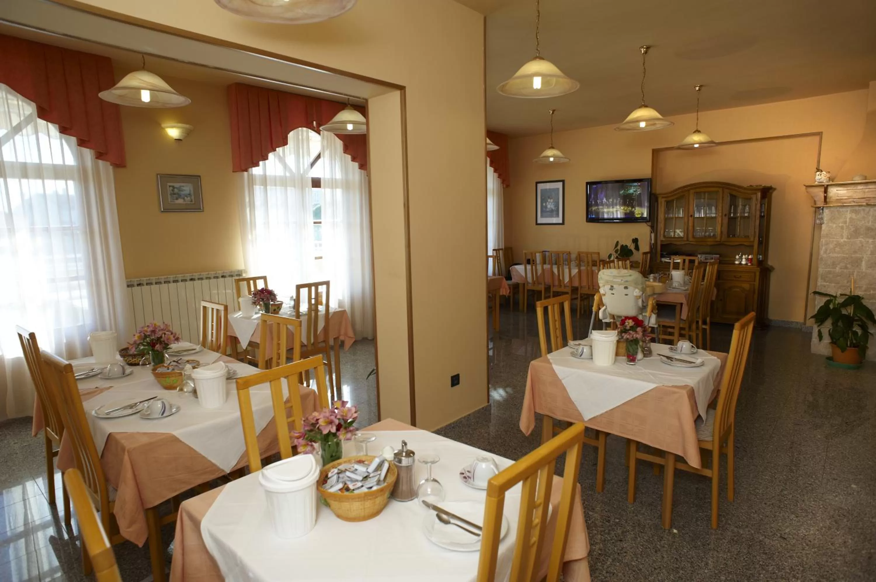 Communal lounge/ TV room in B@B Valbruna