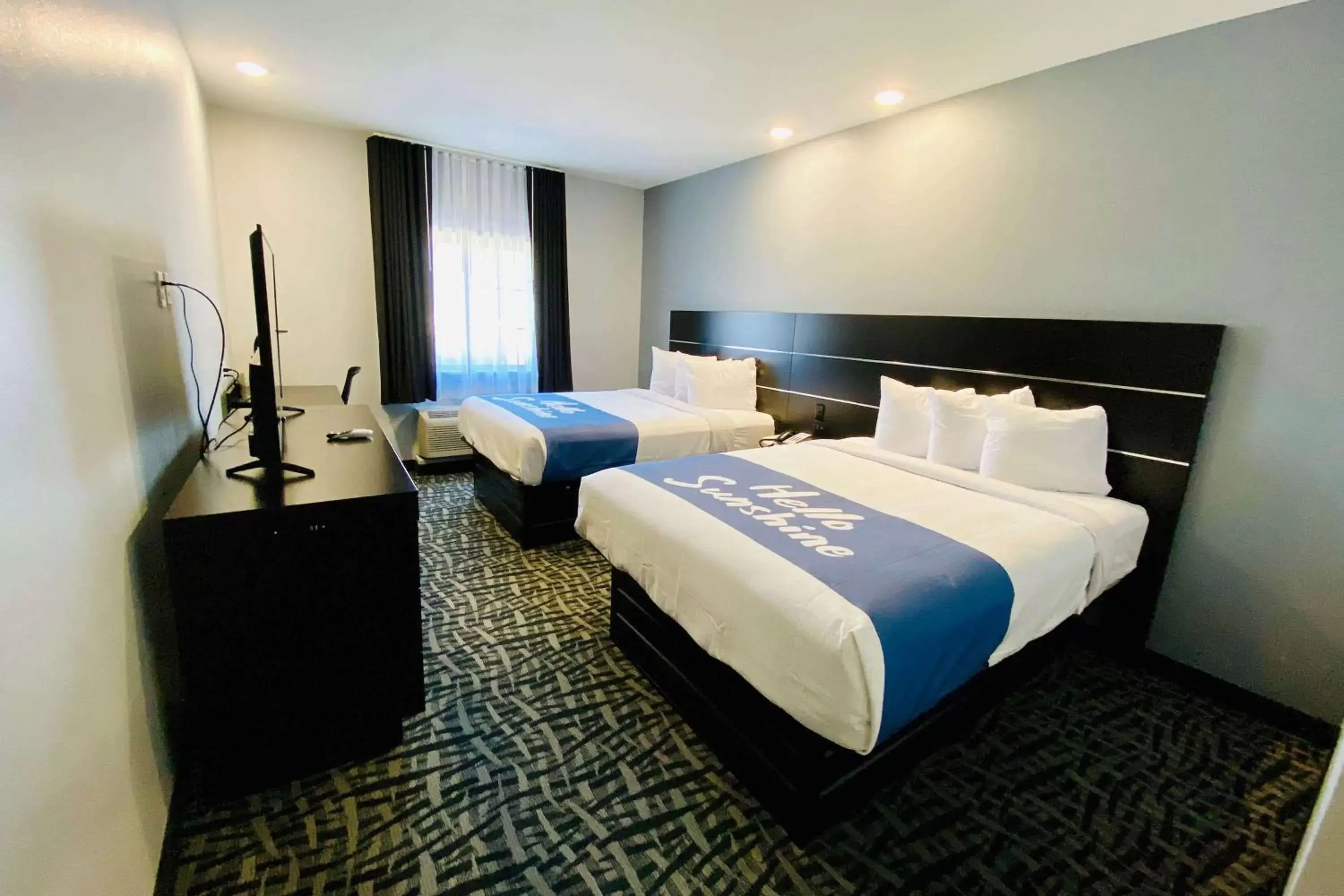 Photo of the whole room, Bed in Days Inn & Suites by Wyndham Horn Lake - Memphis Graceland