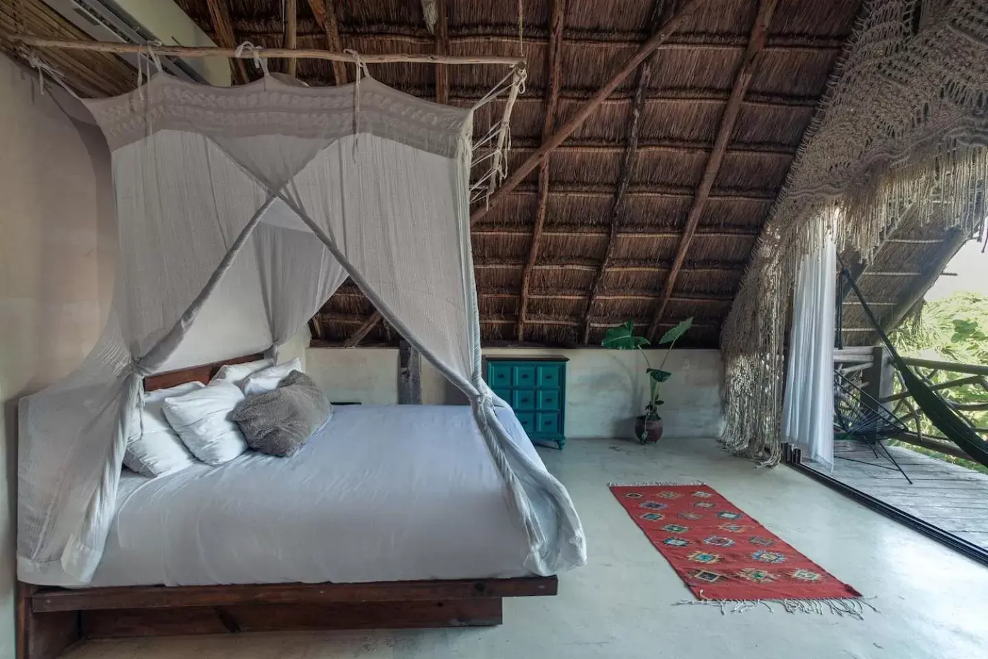 Bed in Hidden Treehouse Tulum Eco-Hotel