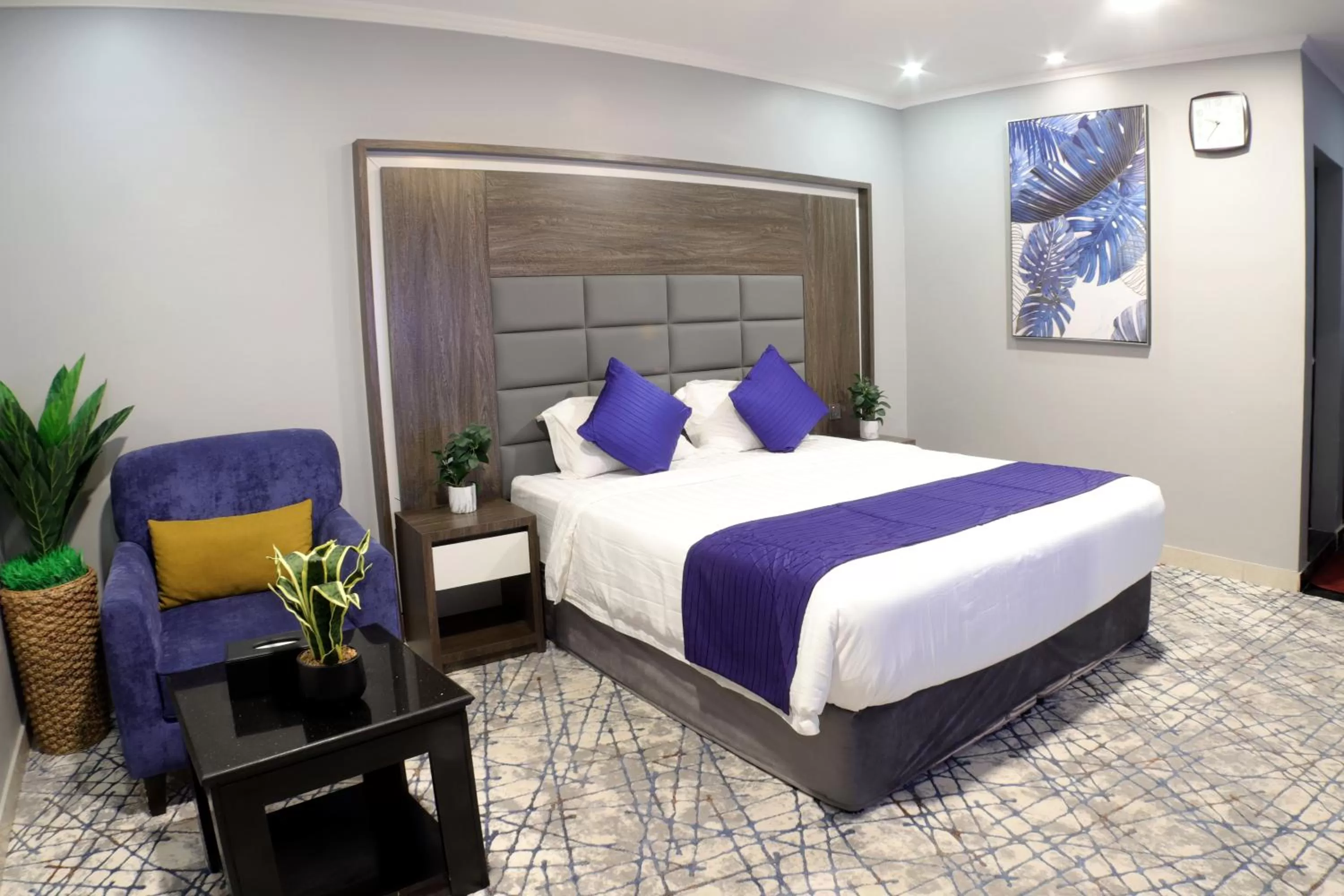 Bed in Maskan Al Dyafah Hotel Apartments