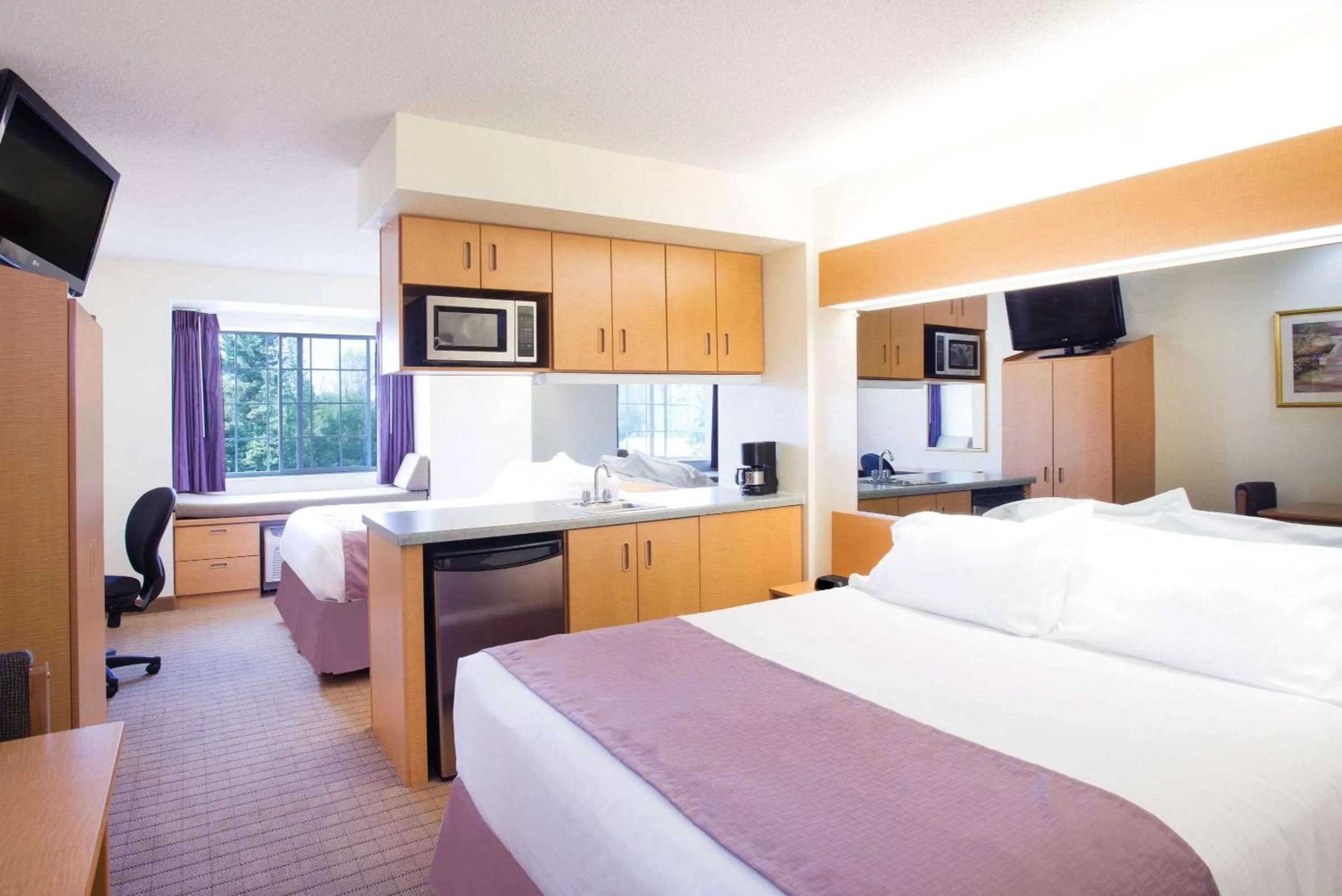 Photo of the whole room, Bed in Microtel Inn & Suites by Wyndham Plattsburgh