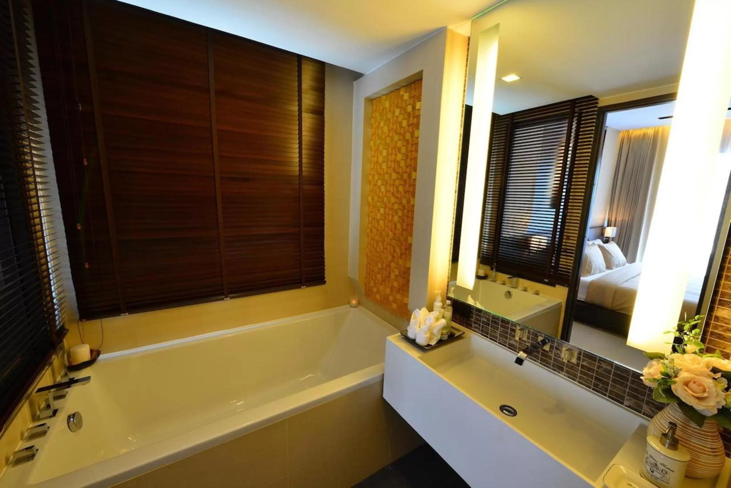 Bathroom in The Charm Resort Phuket - SHA Certified