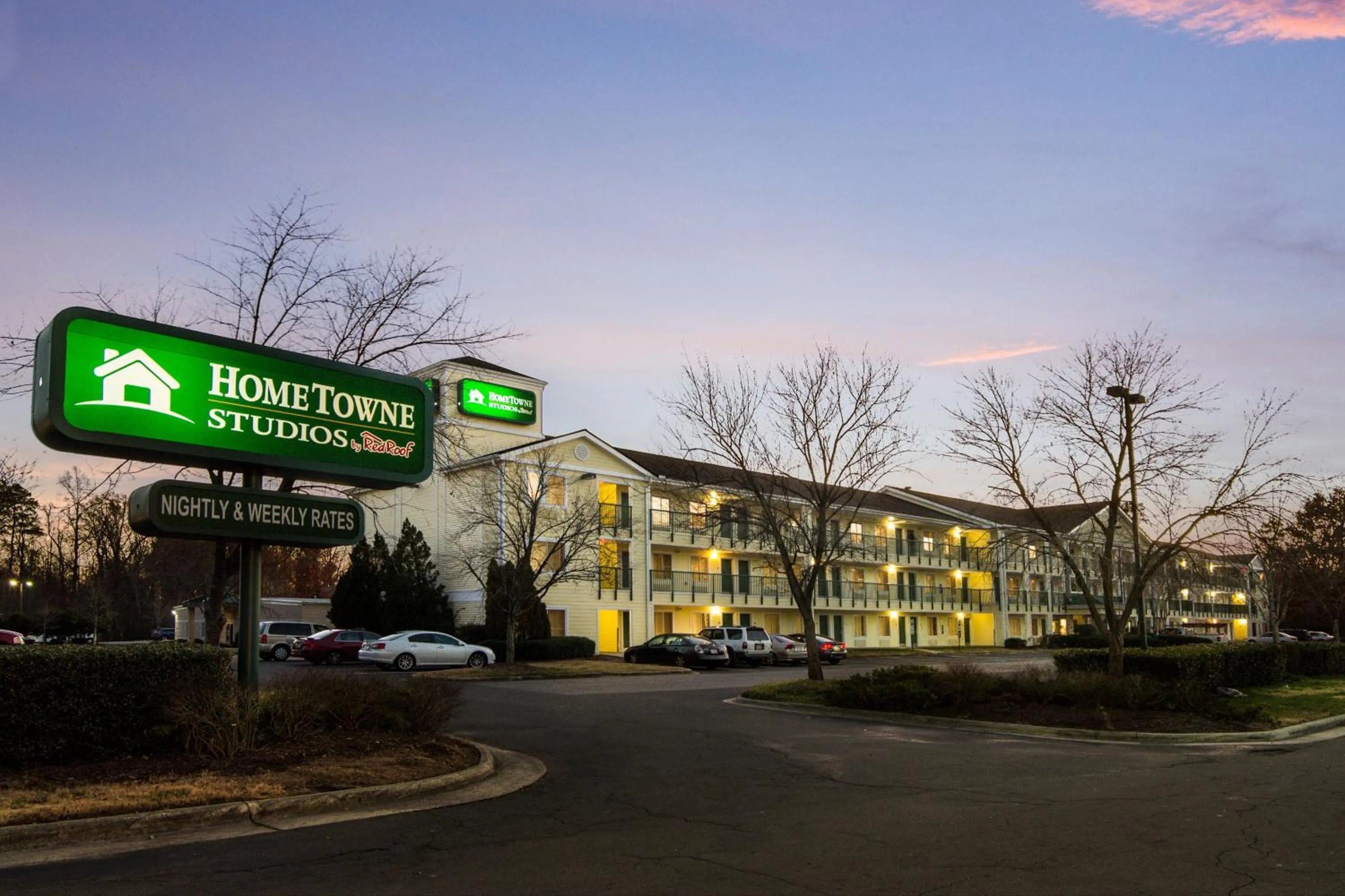 Property building in HomeTowne Studios by Red Roof Raleigh – Durham