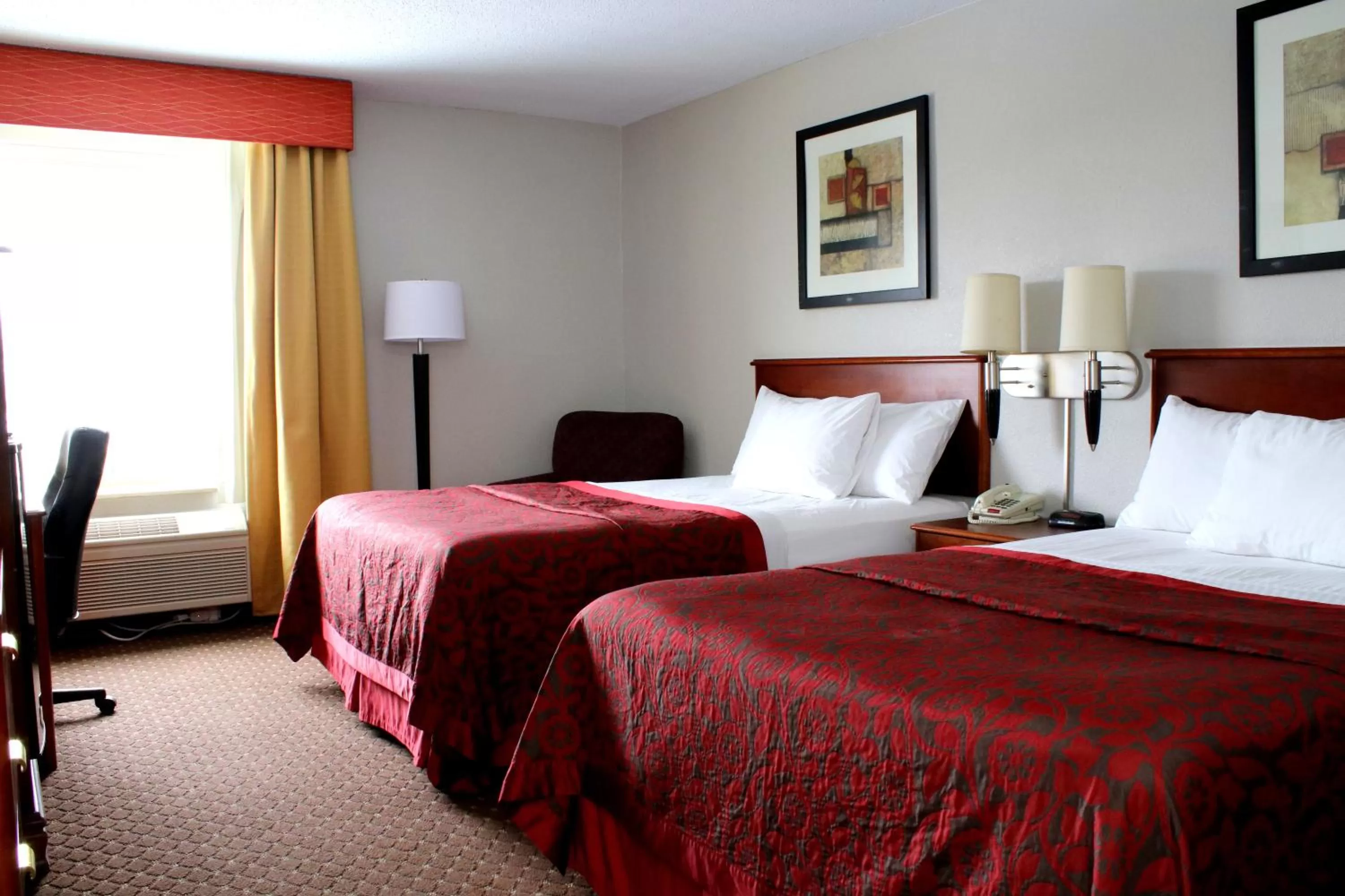 Photo of the whole room, Bed in Days Inn & Suites by Wyndham Bloomington/Normal IL