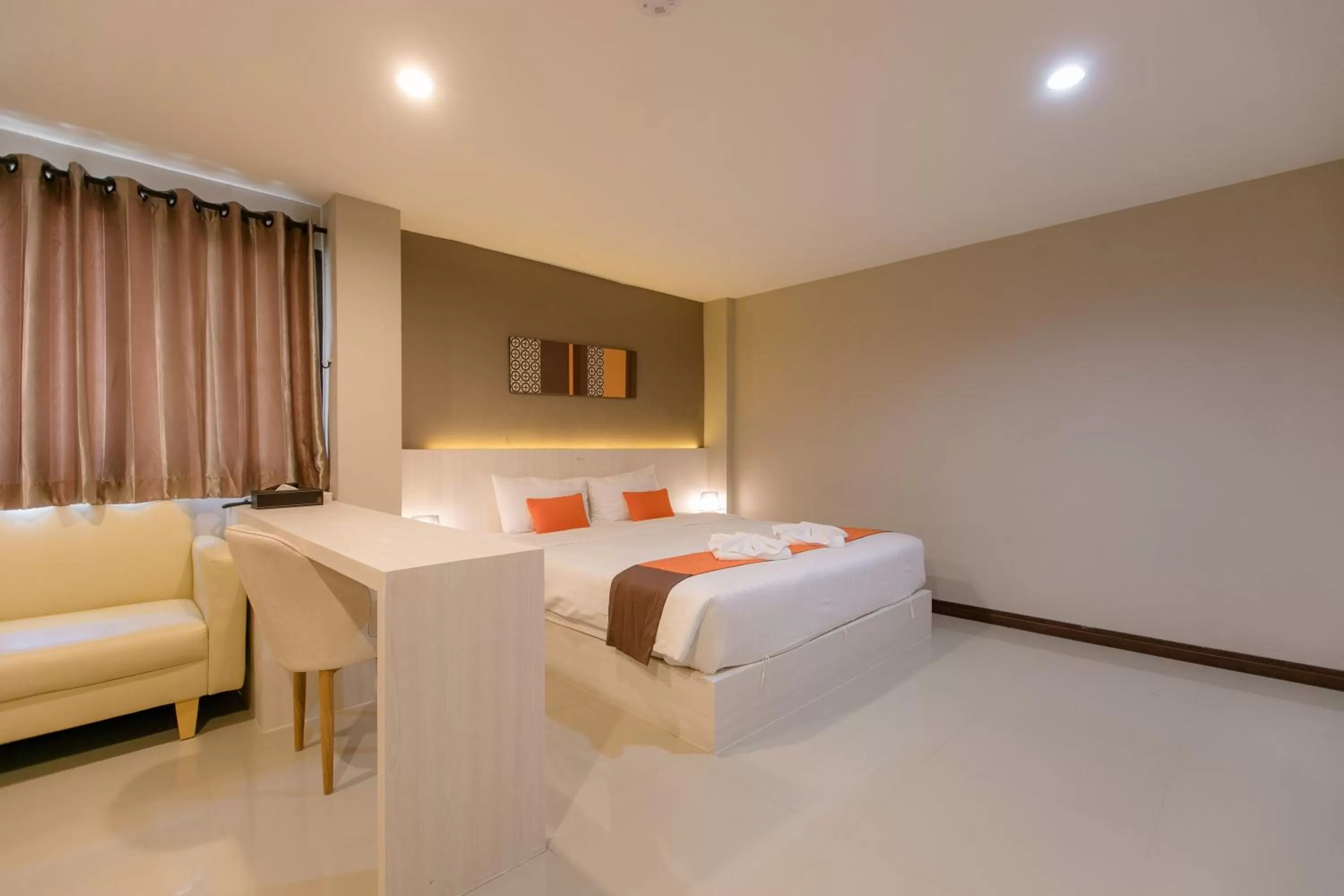 Bed in De Hug Hotel & Residence