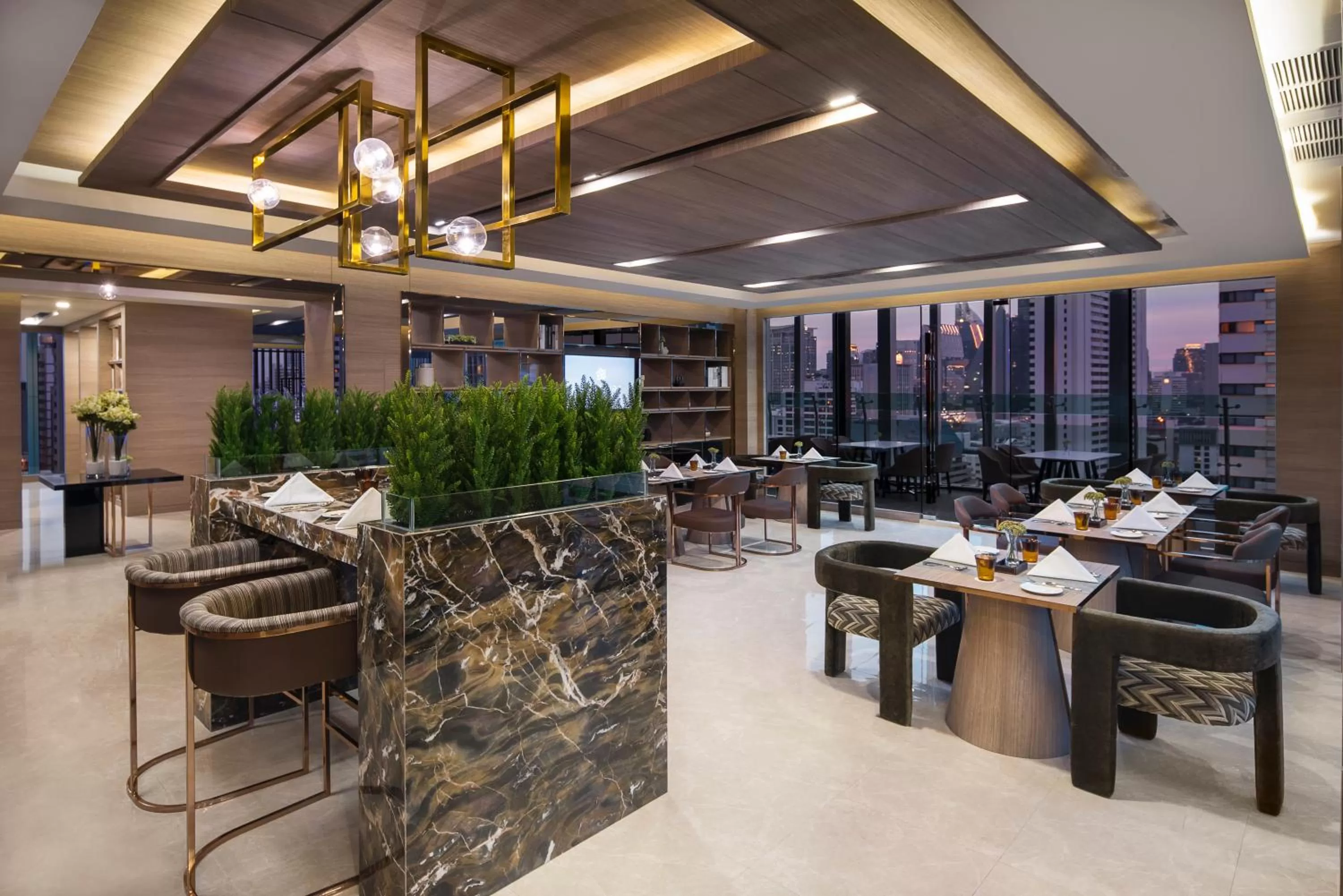 Communal lounge/ TV room in Solitaire Bangkok Sukhumvit 11