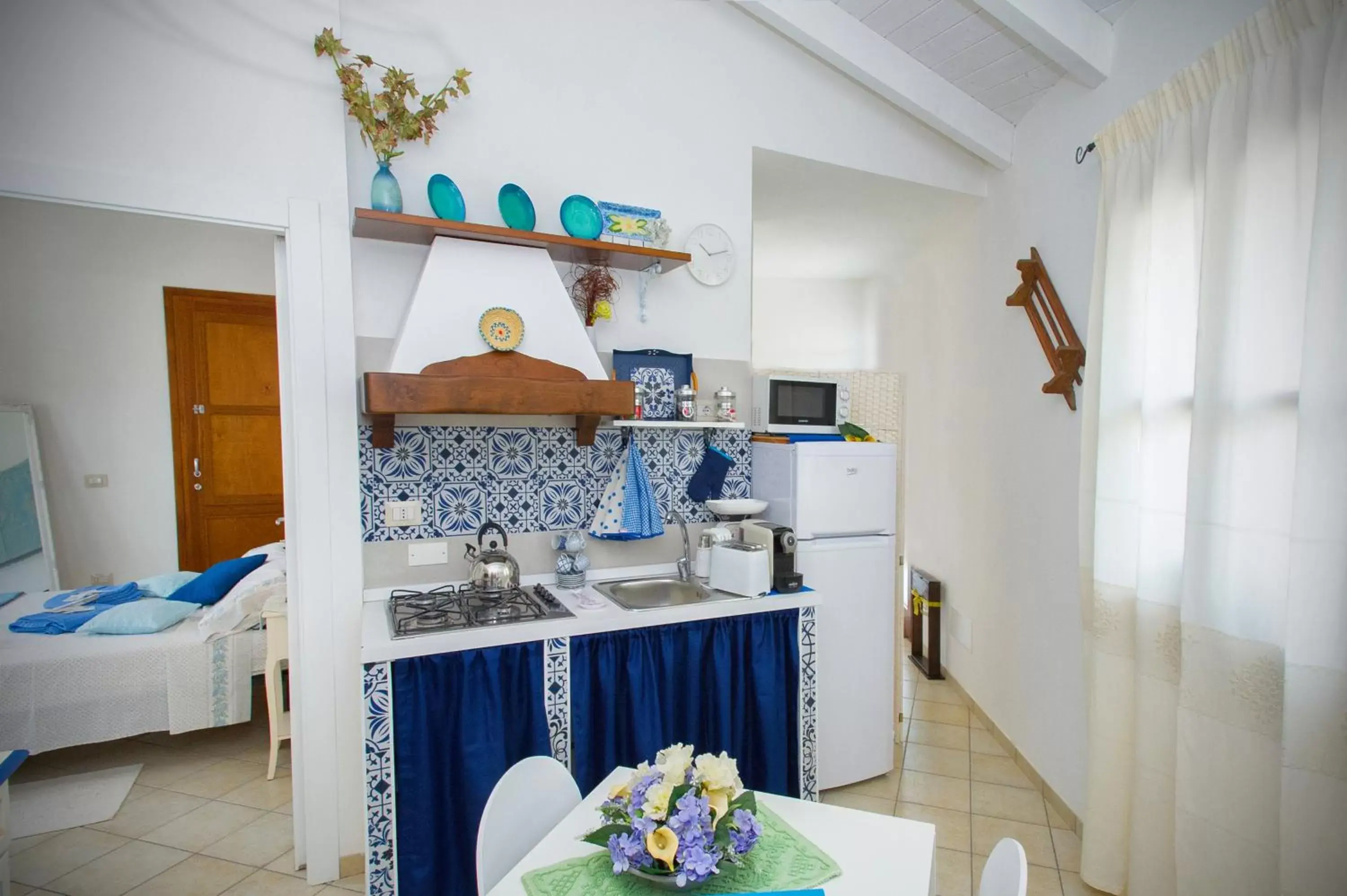 Kitchen/Kitchenette in Holiday Room Sa Tebia