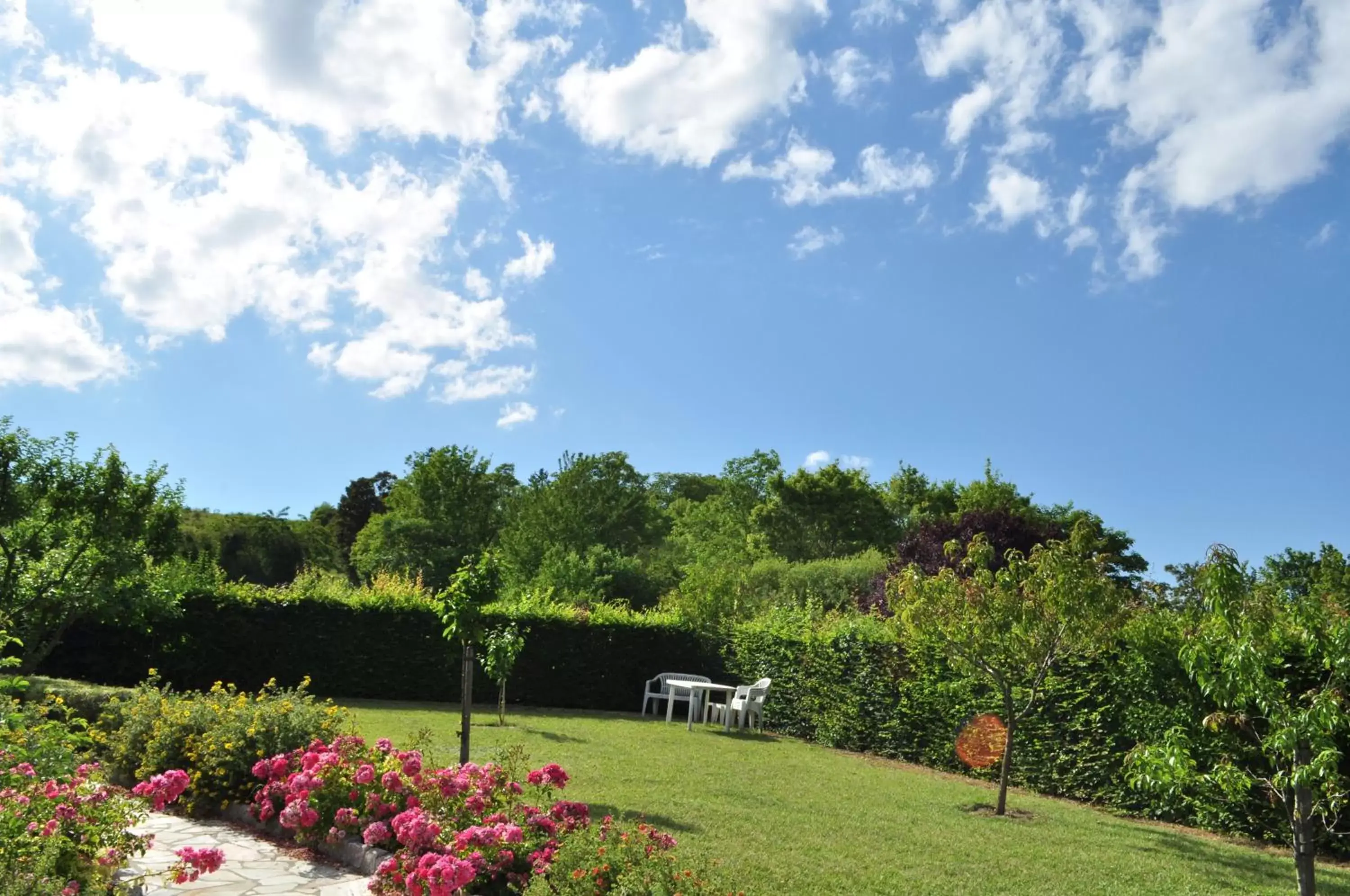 View (from property/room), Garden in Hôtel-Logis La Coraline