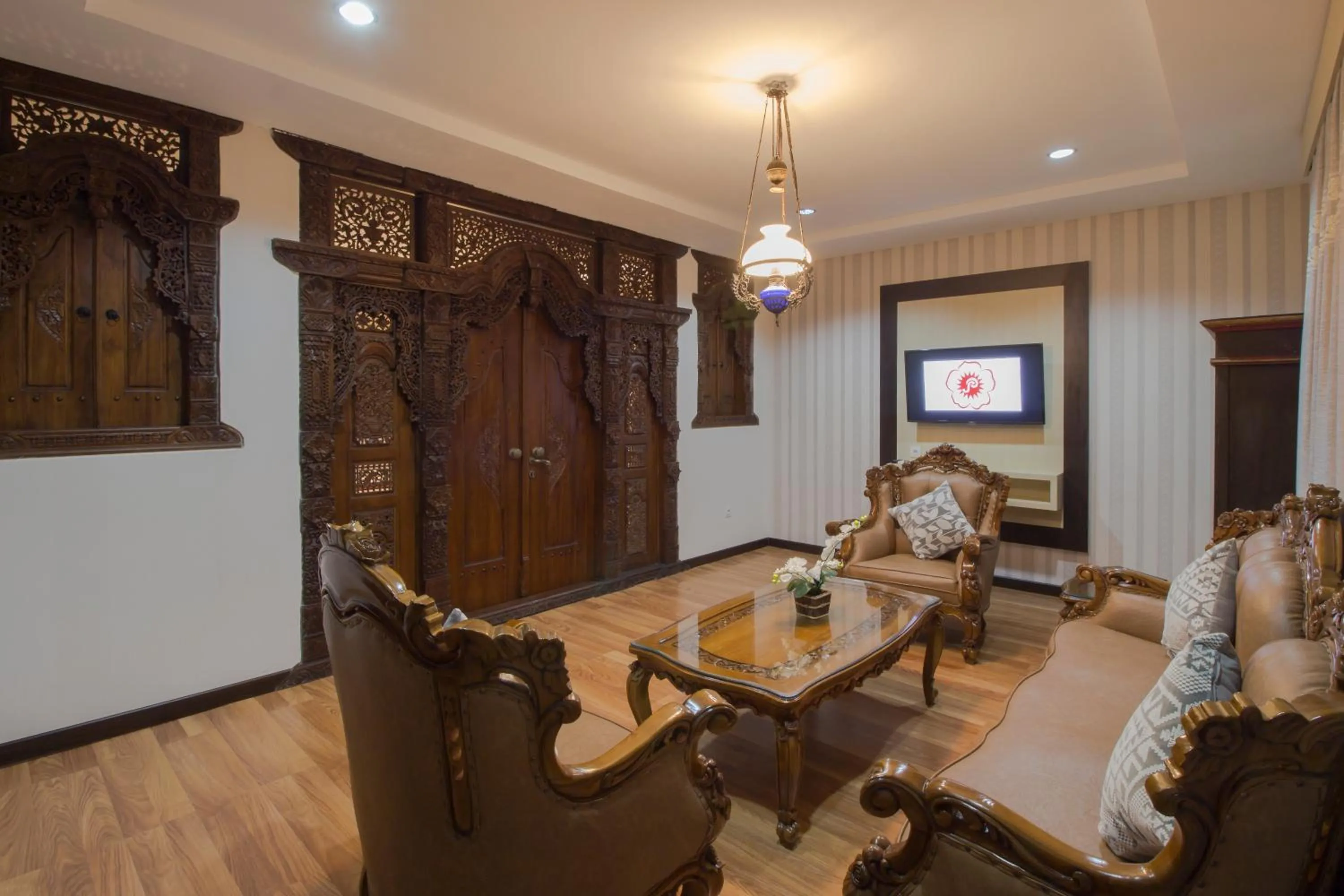 Living room in Grand Puri Saron Hotel Yogyakarta