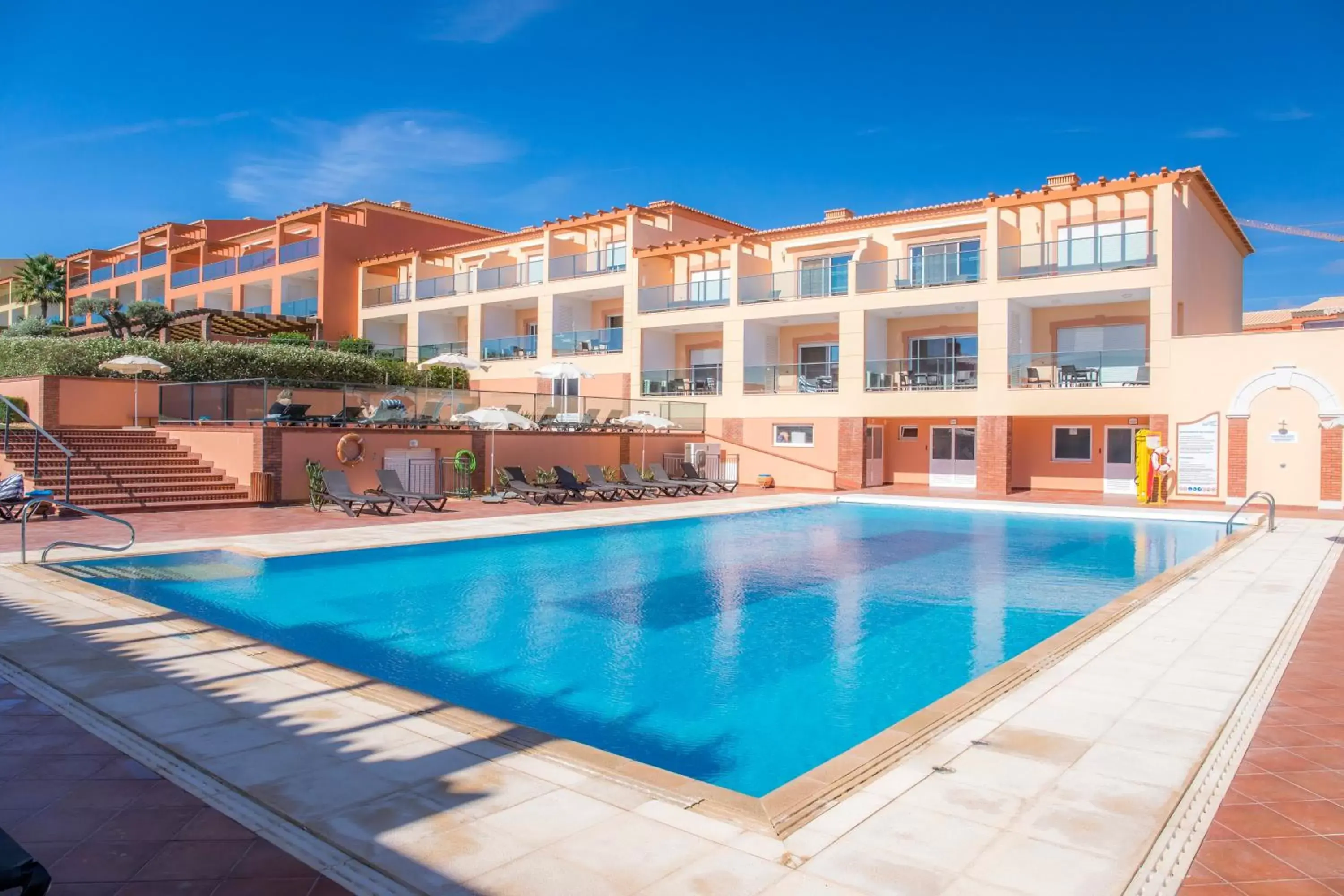 Swimming pool, Property Building in Boavista Golf & Spa - Bela Colina Village