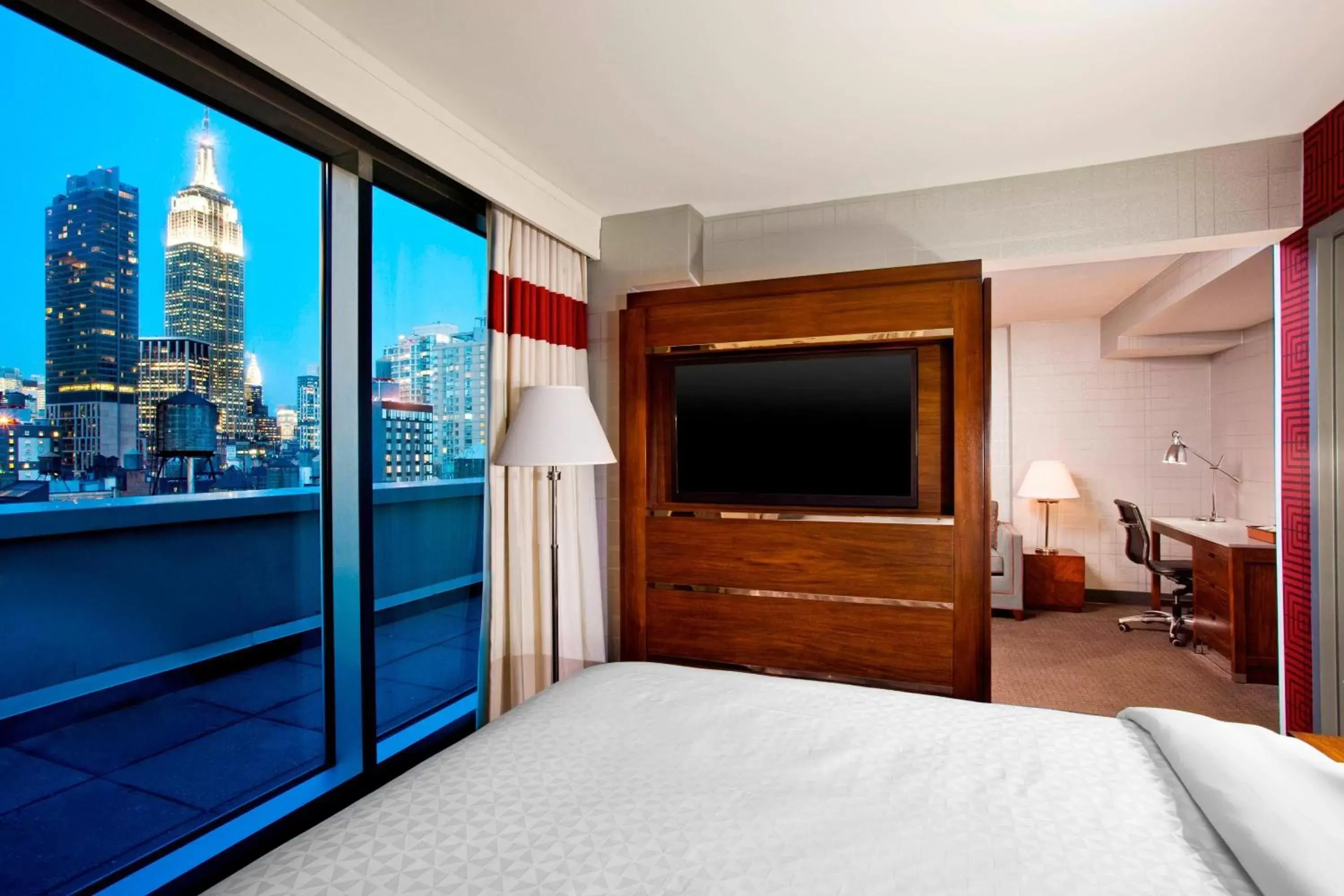 Bedroom, TV/Entertainment Center in Four Points by Sheraton Manhattan Chelsea