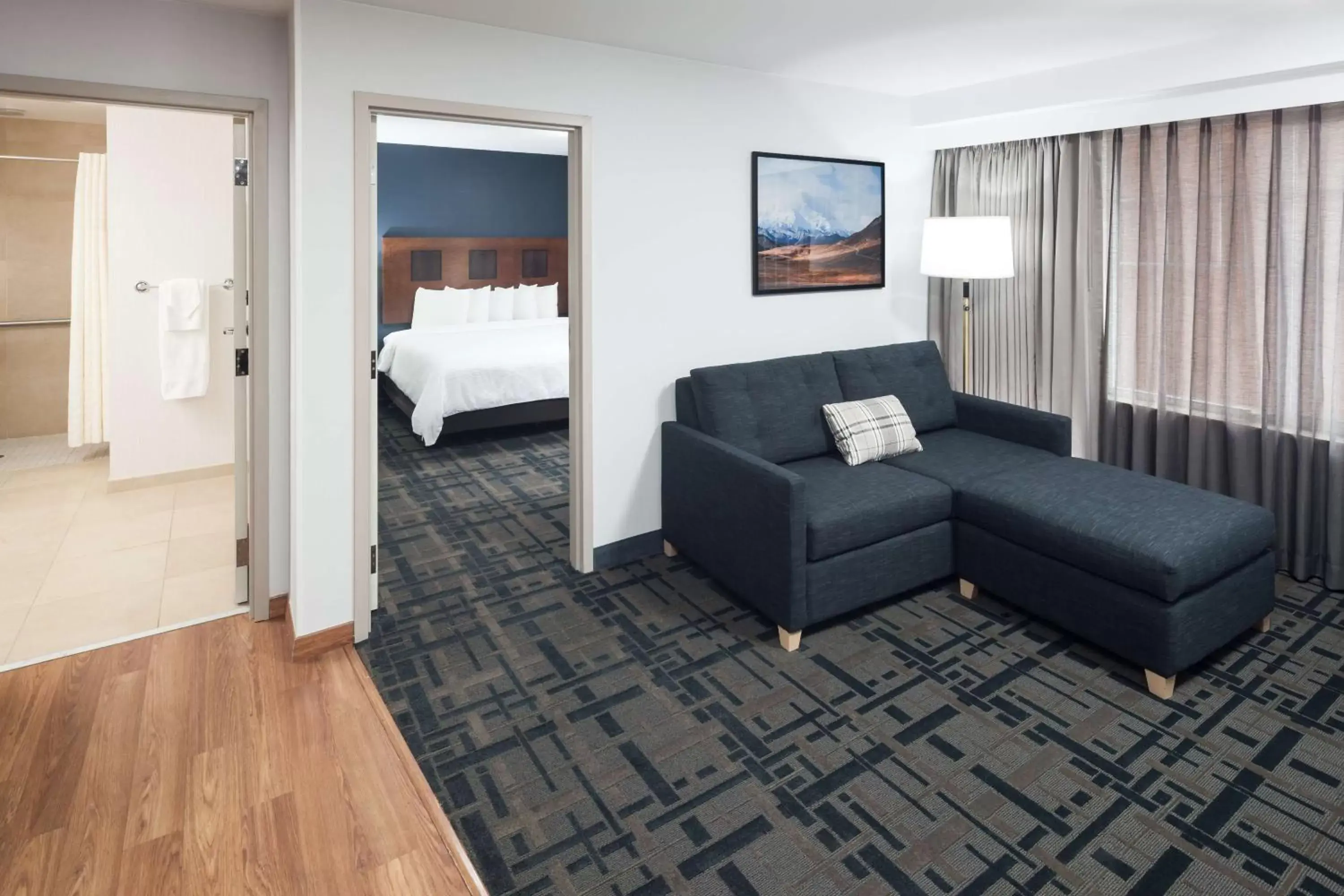 Living room, Bed in Embassy Suites Anchorage Living room, Bed in Embassy Suites Anchorage