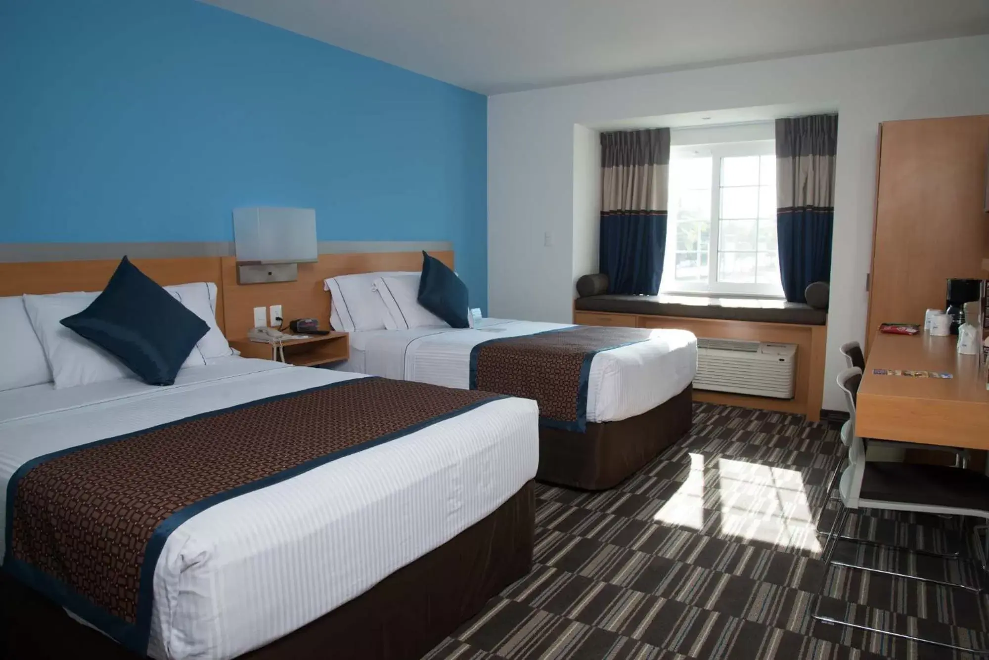 Photo of the whole room, Bed in Microtel Inn & Suites by Wyndham Culiacán