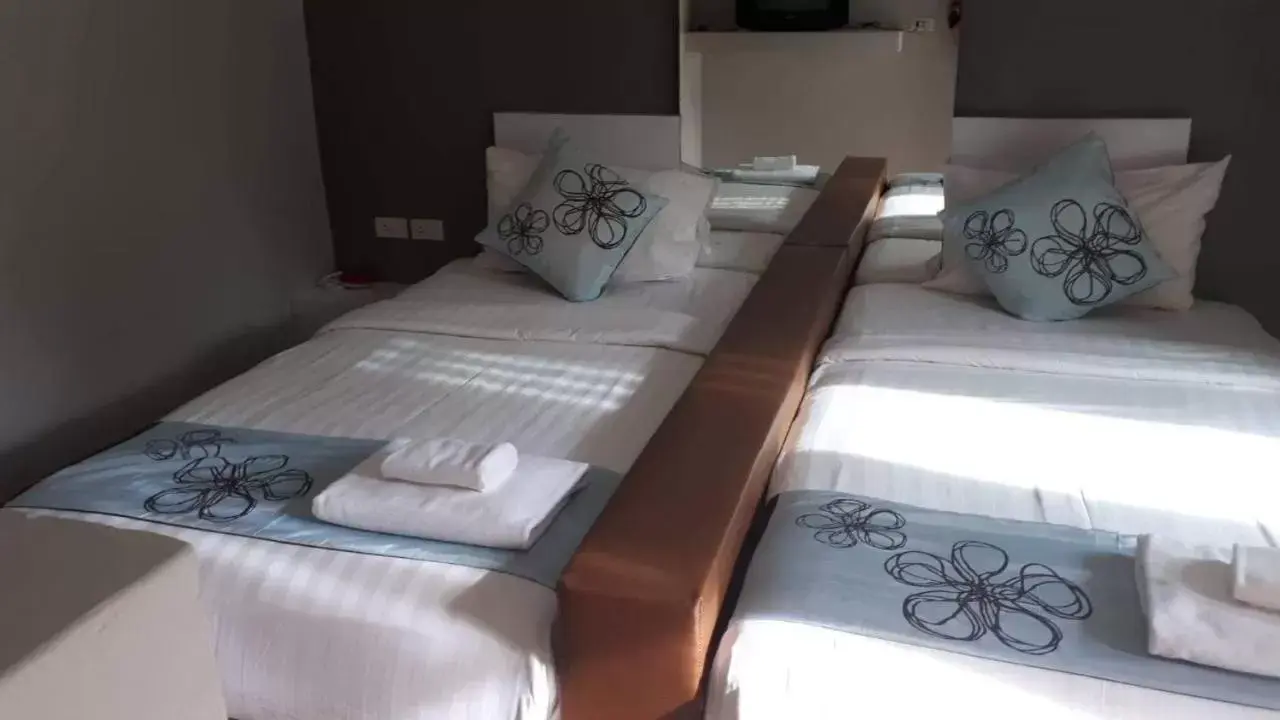 Bed in Panlaan Boutique Resort