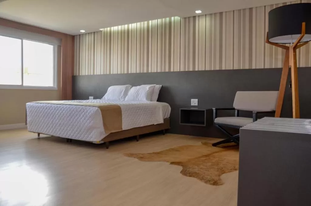 Bed in M Tower Hotel