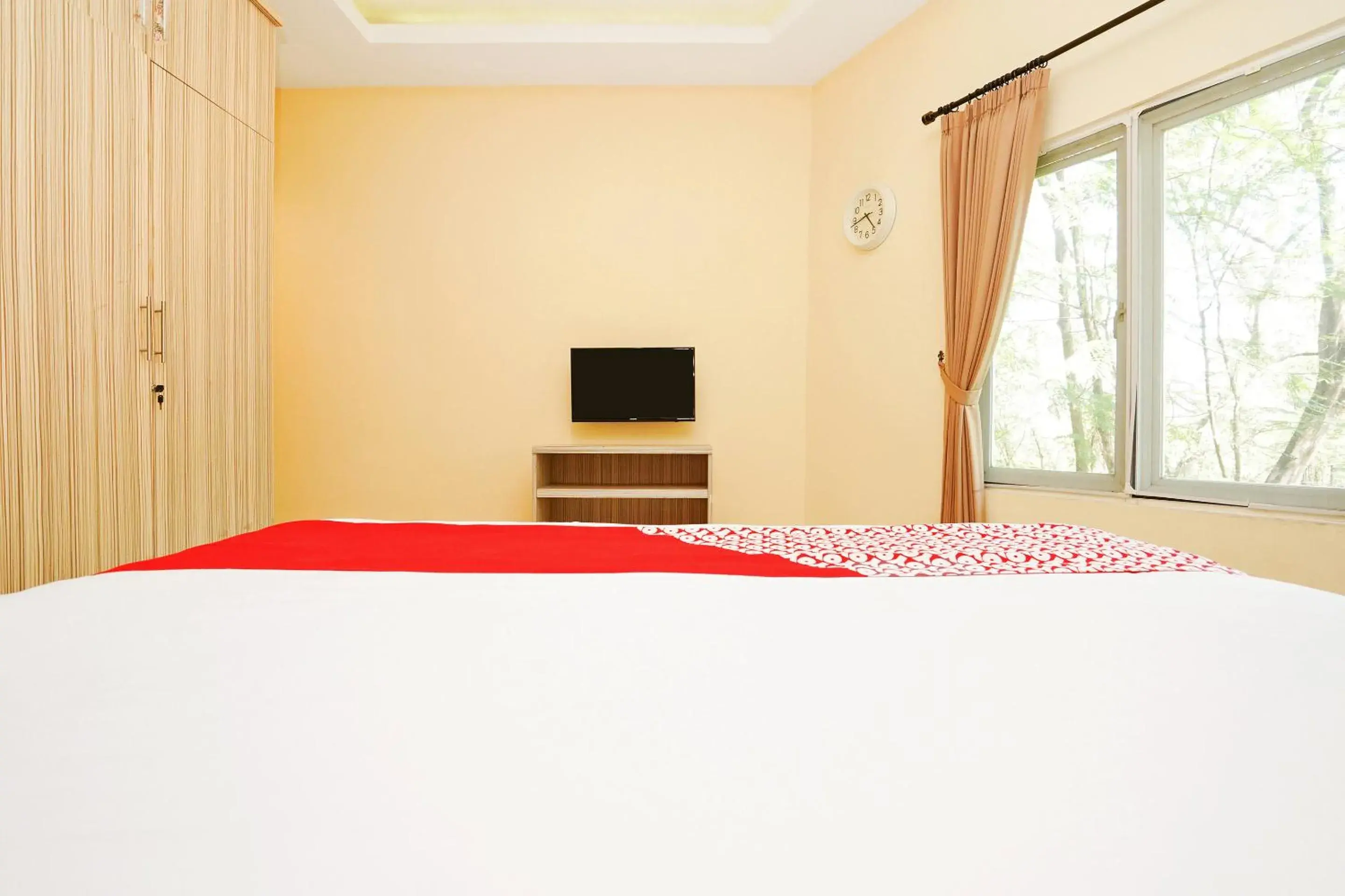 Bedroom in OYO 175 K-60 Residence