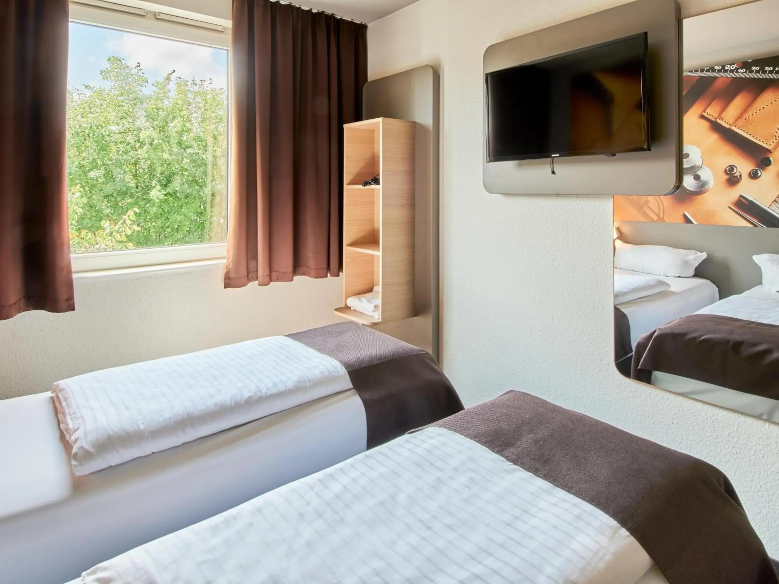 Bed in B&B Hotel Offenbach-Süd Bed in B&B Hotel Offenbach-Süd