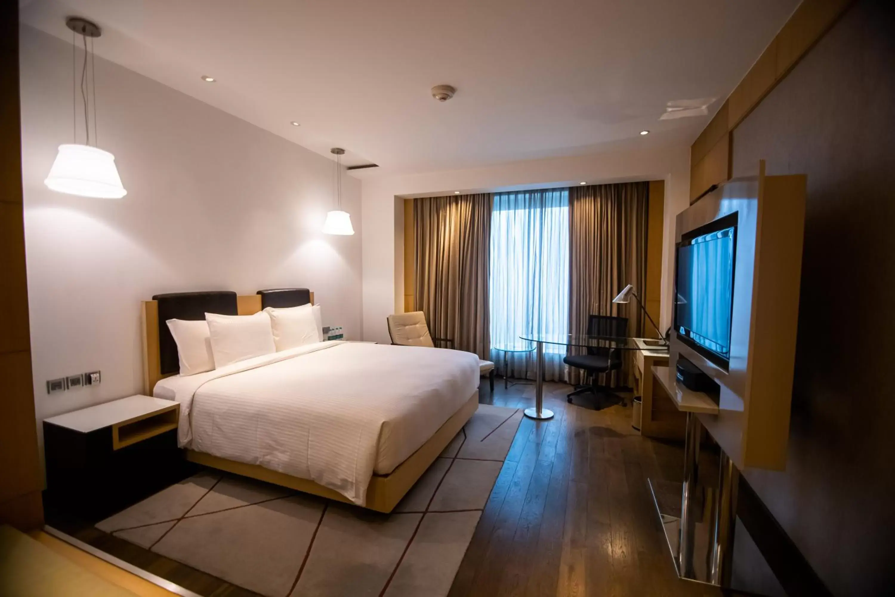 Bedroom, Bed in Crowne Plaza Greater Noida by IHG Bedroom, Bed in Crowne Plaza Greater Noida by IHG