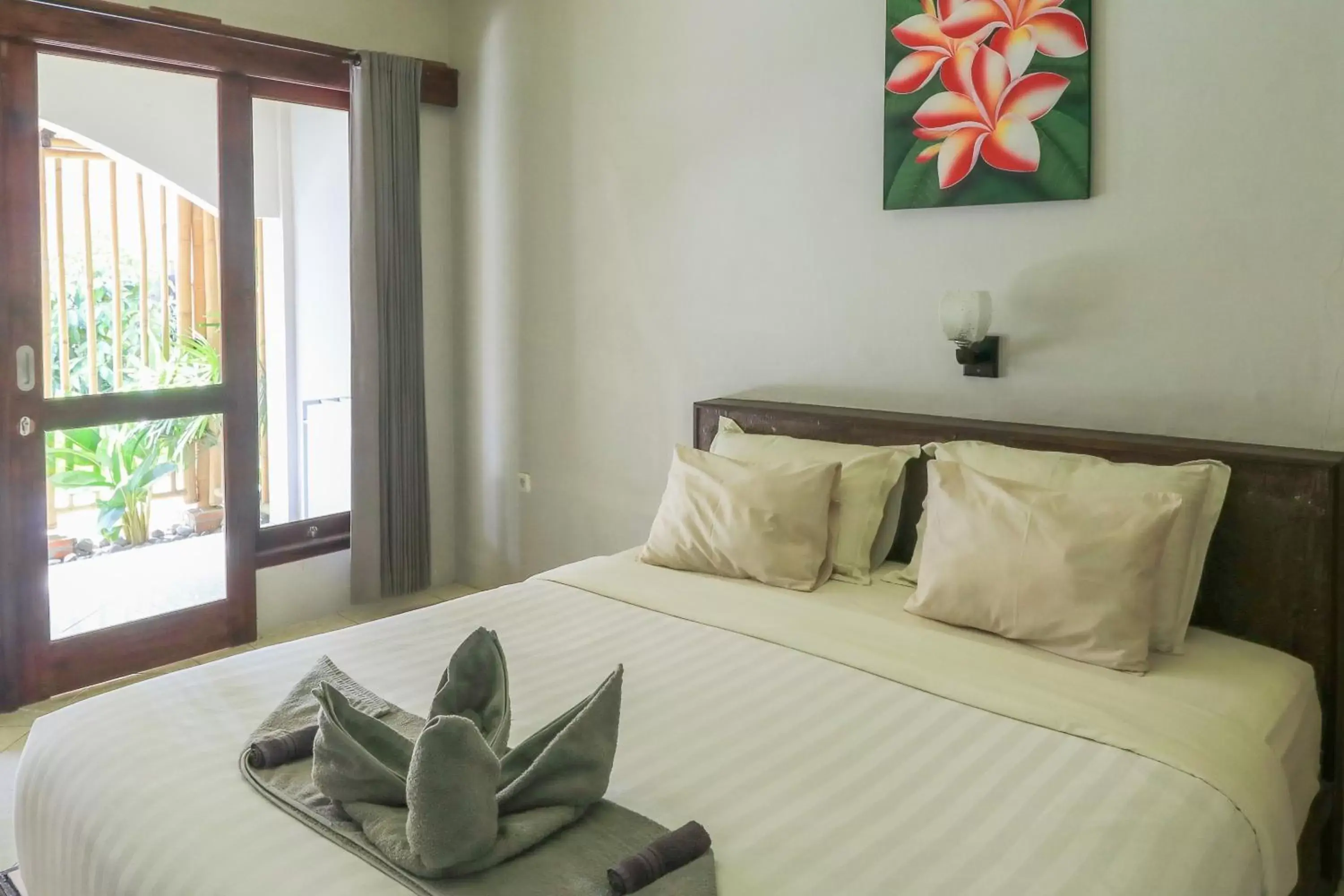 Bedroom, Bed in Senggigi Cottages Lombok