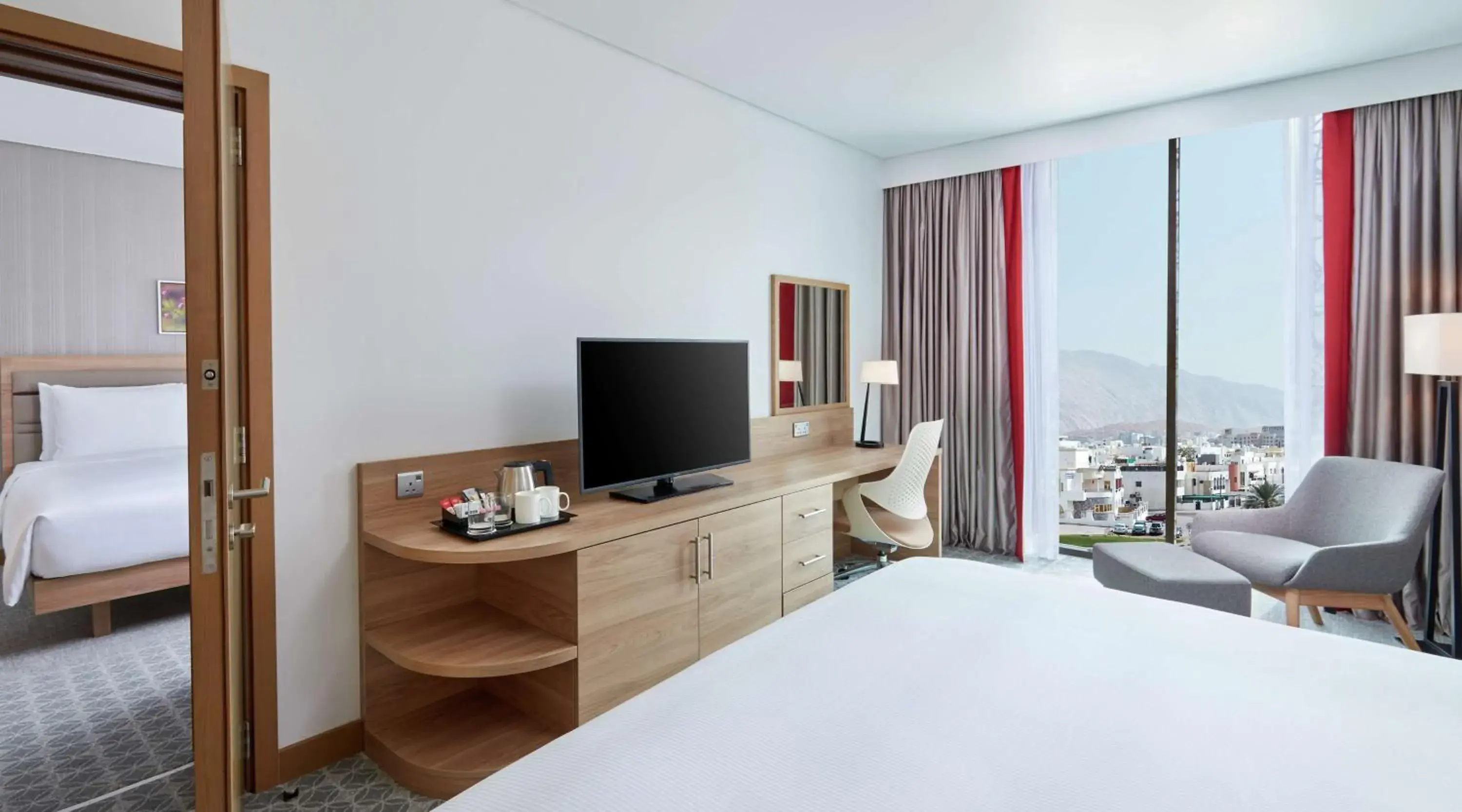 Bedroom, TV/Entertainment Center in Hilton Garden Inn Muscat Al Khuwair