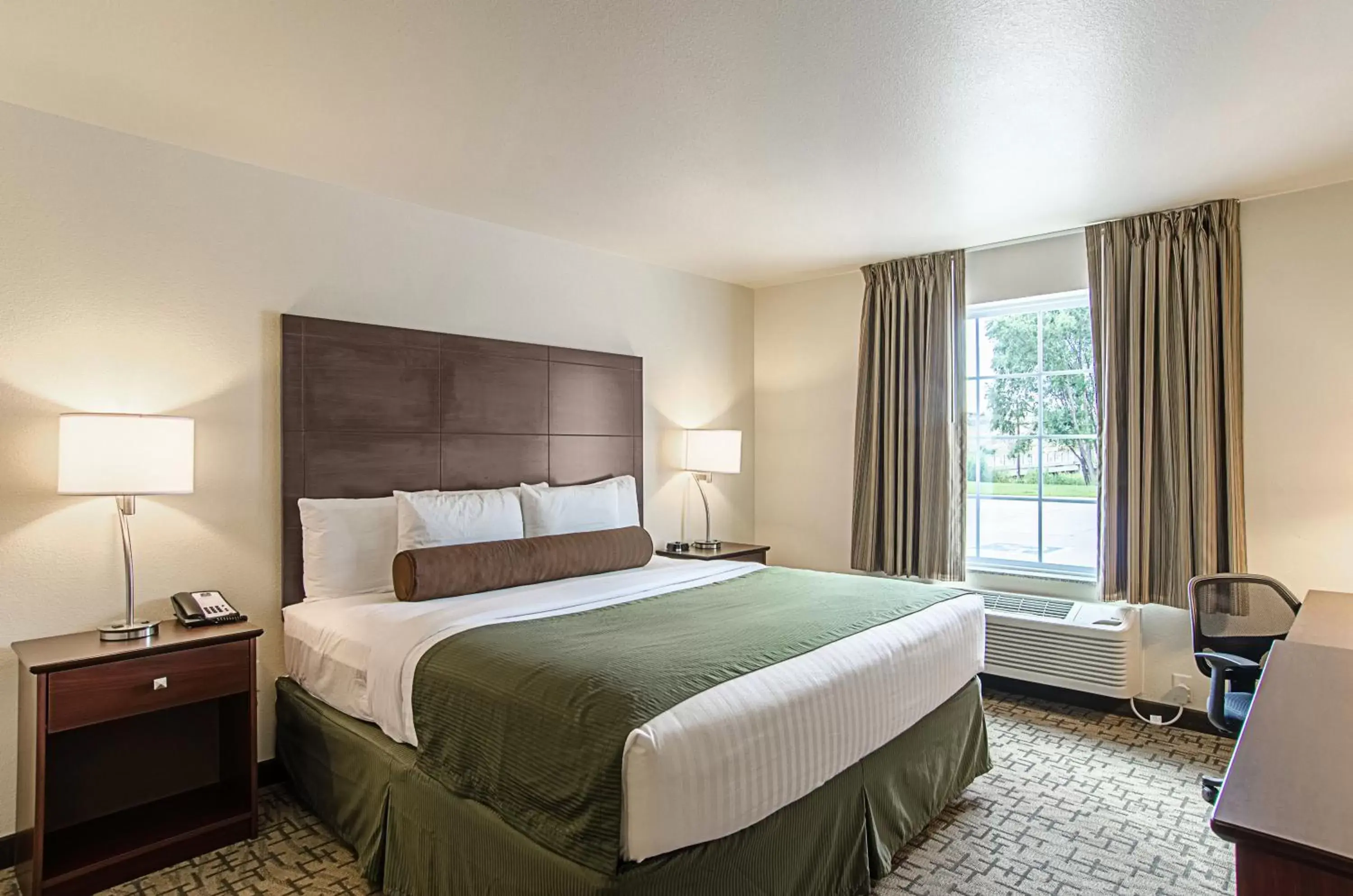 Bed in Cobblestone Inn & Suites - Guernsey Bed in Cobblestone Inn & Suites - Guernsey