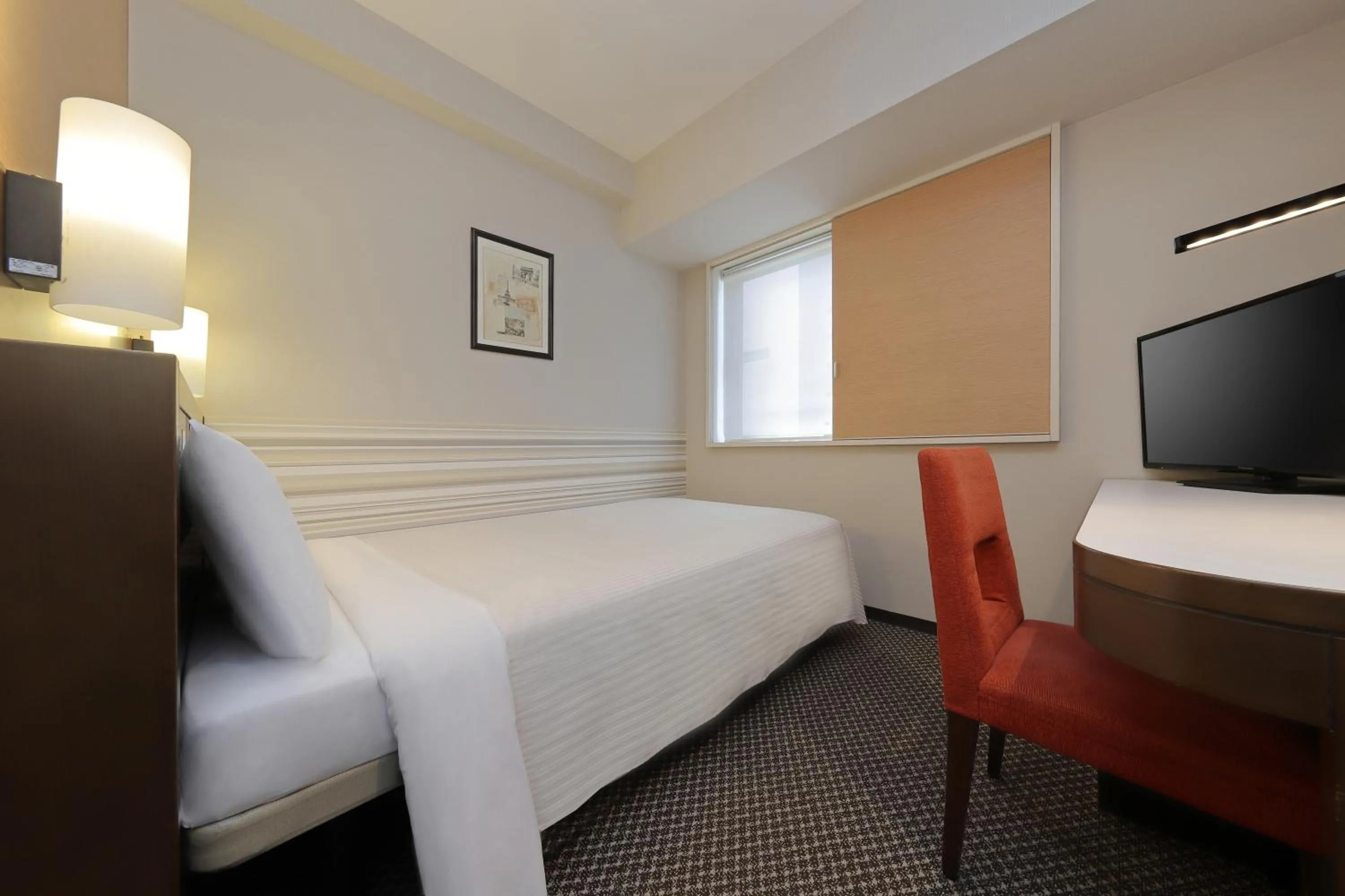 Bed in Keio Presso Inn Shinjuku