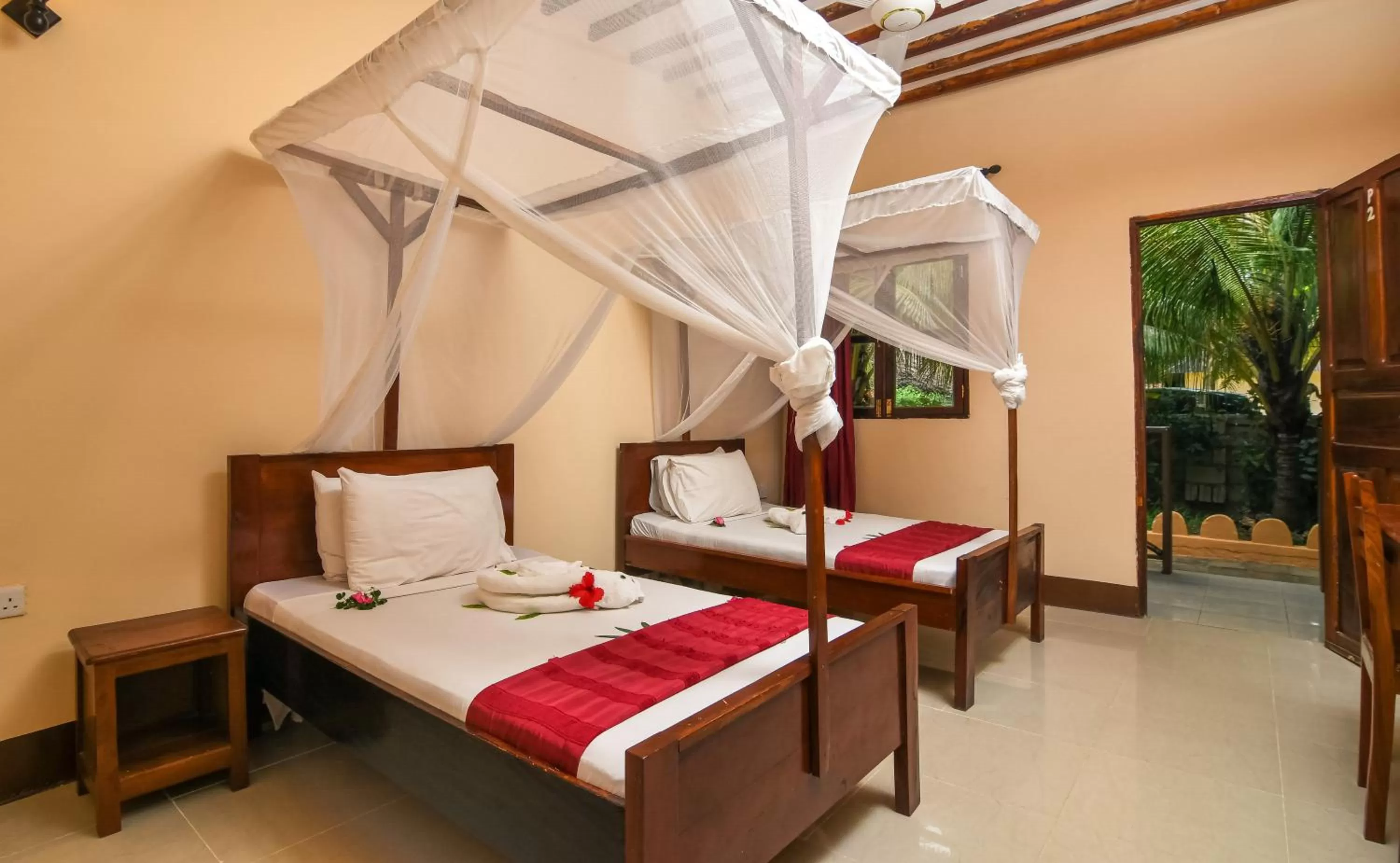 Bed in Amaan Beach Bungalows