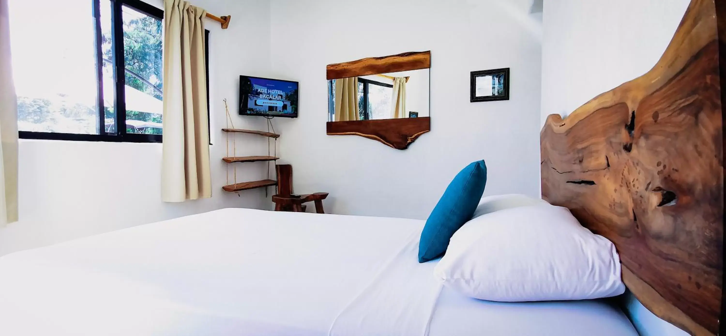 Bed in Ade Hotel Bacalar
