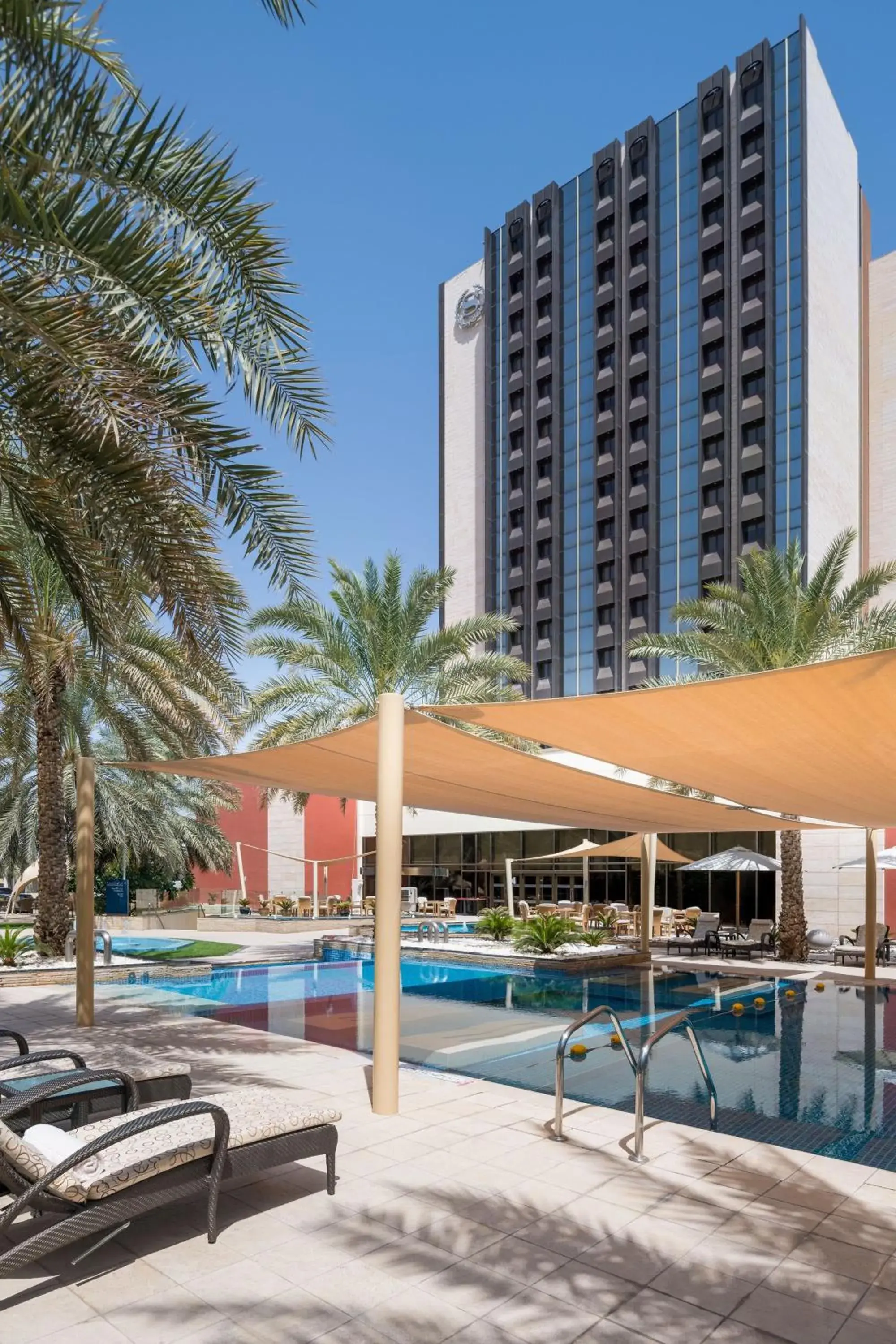 Property building, Swimming Pool in Sheraton Oman Hotel