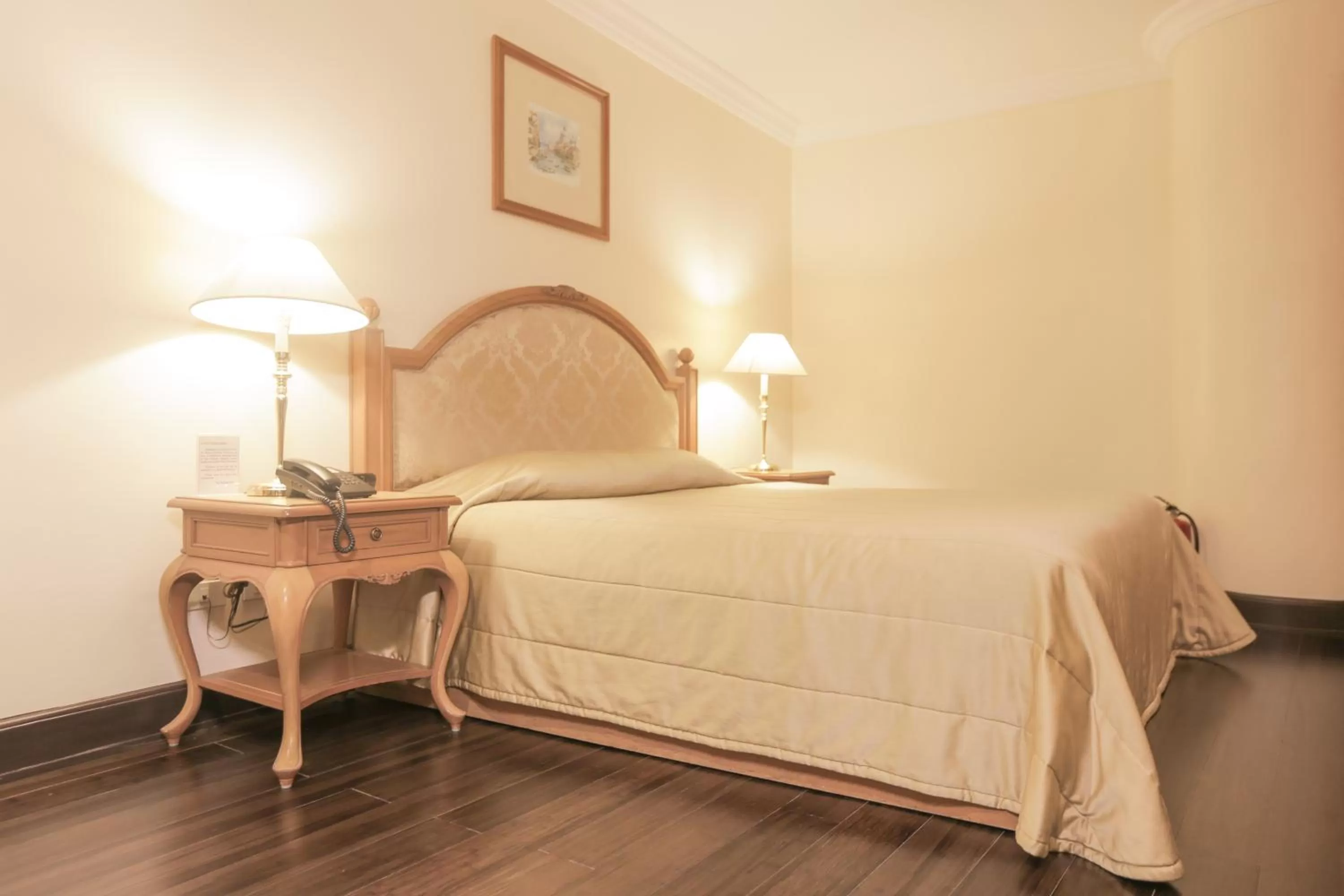 Bed in The Grand Dame Hotel